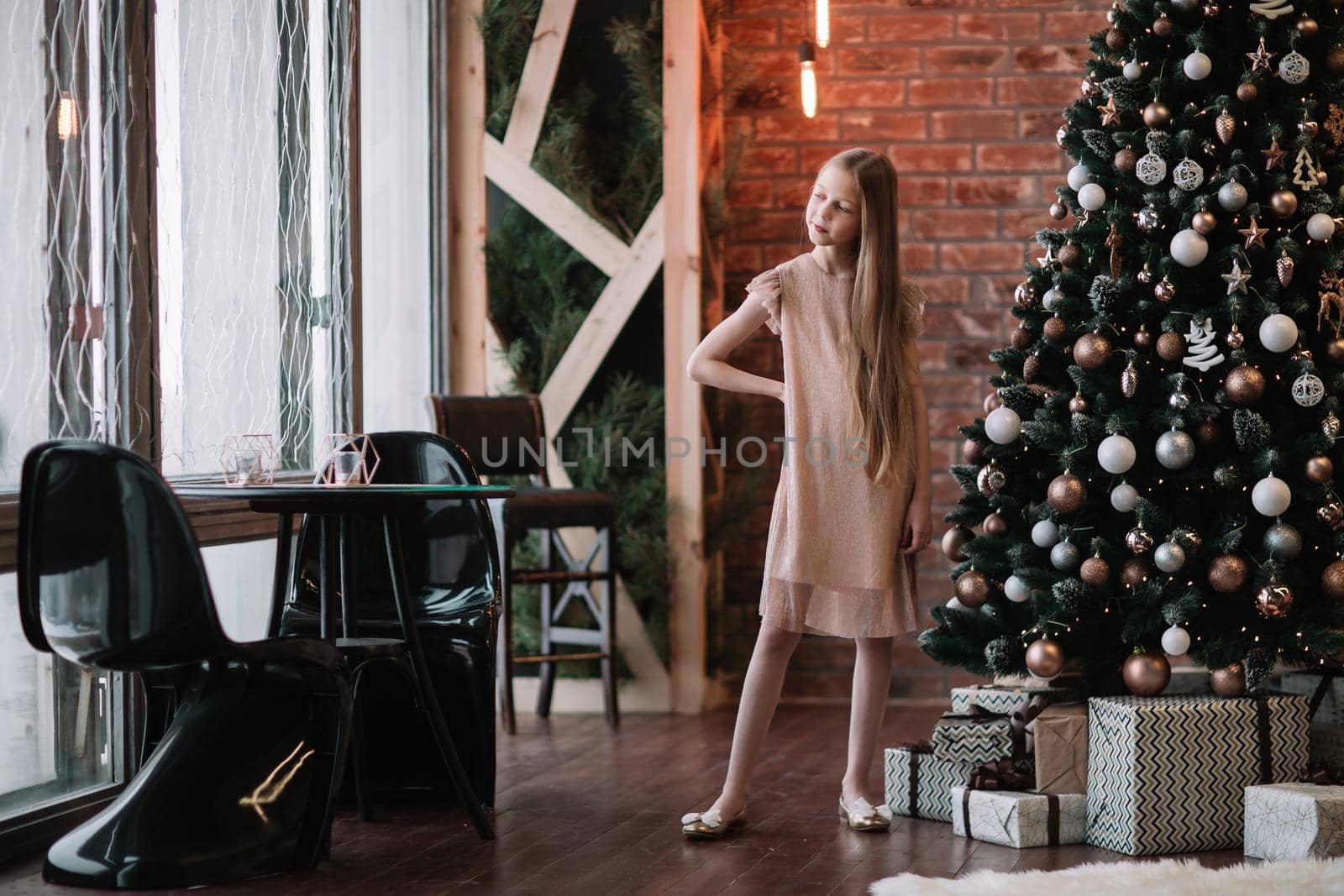 cute girl standing in a decorated living room by SmartPhotoLab