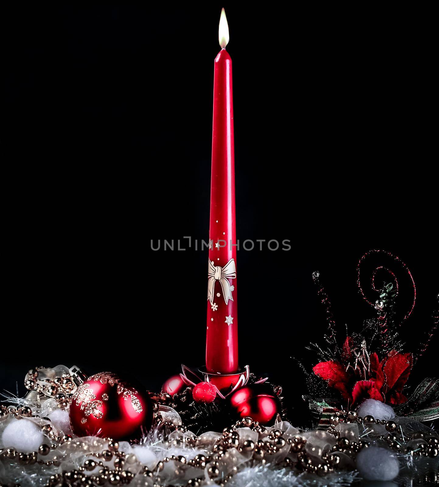 candle and Christmas composition on a black background by SmartPhotoLab