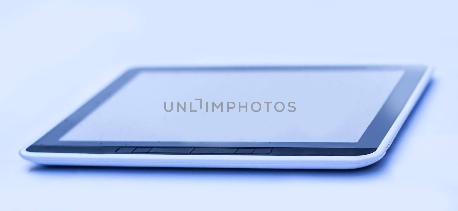 closeup . black tablet pc . isolated on a black background.photo with copy space