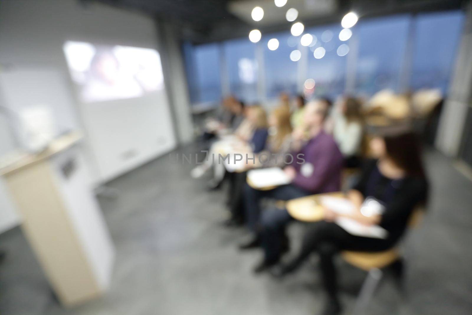 business background. blurred image of business team at presentation. by SmartPhotoLab