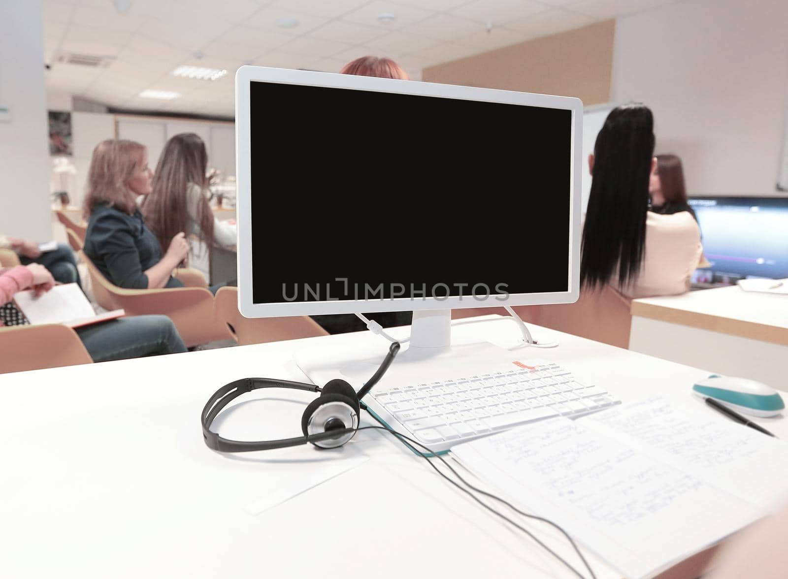 close up. the computer monitor on the table in the conference room by SmartPhotoLab