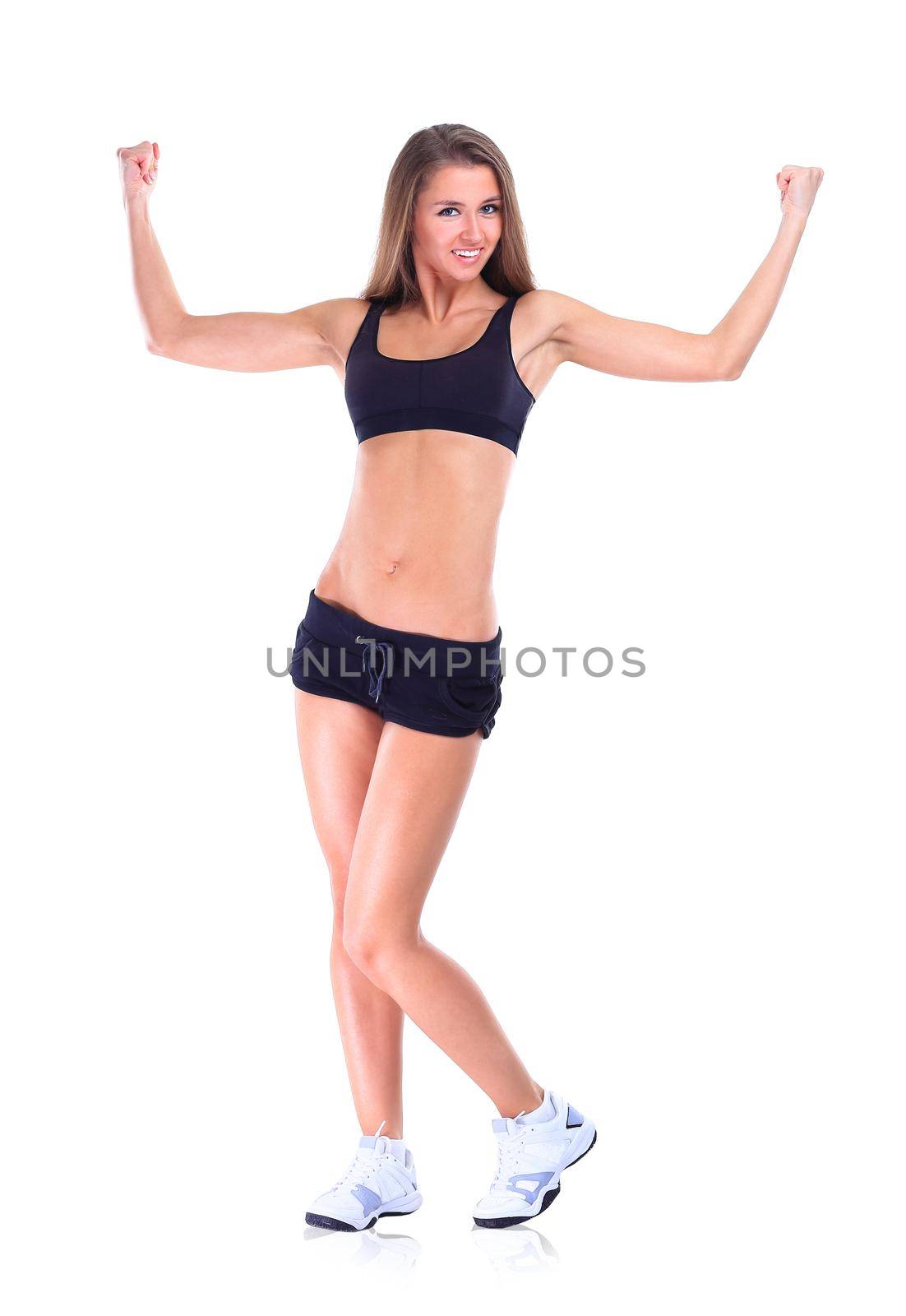 young cheerful smiling woman in sports wear, isolated over white background by SmartPhotoLab