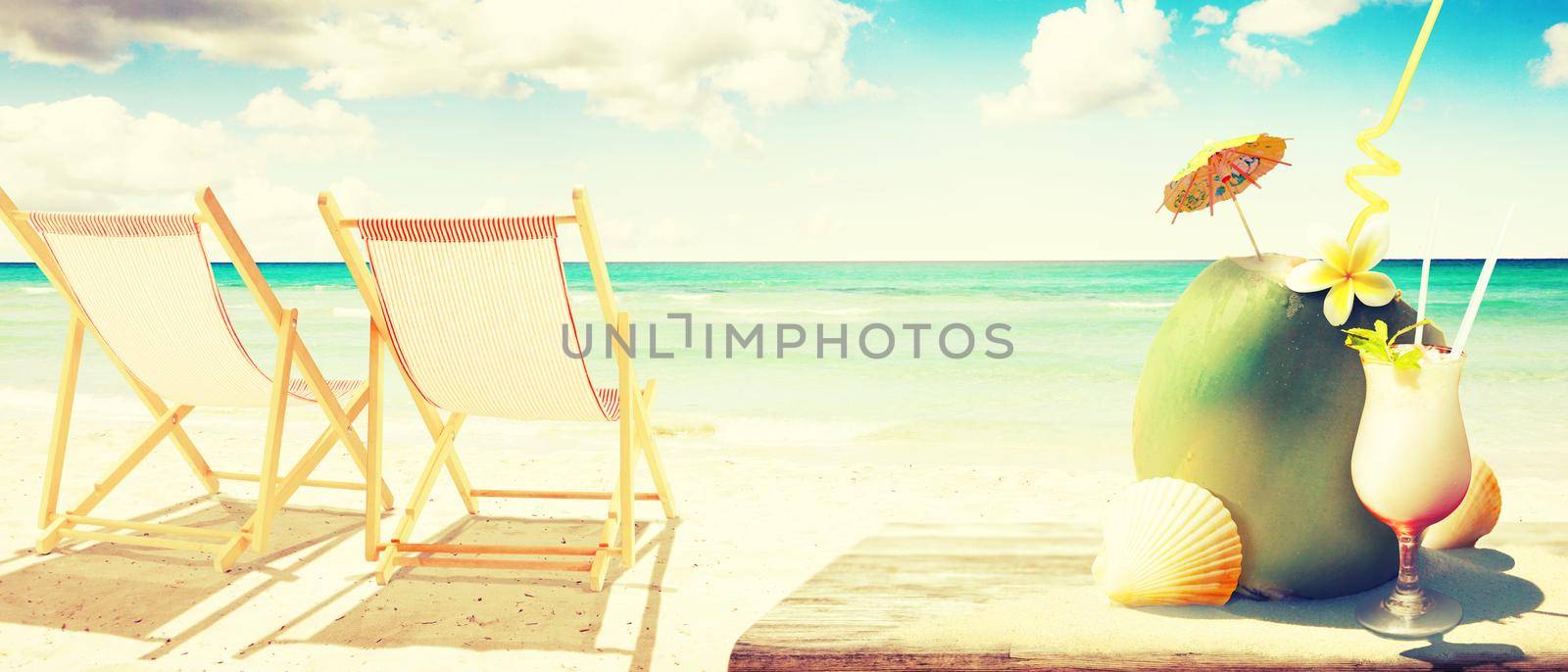 Sandy tropical beach with summer drinks. Holiday background.