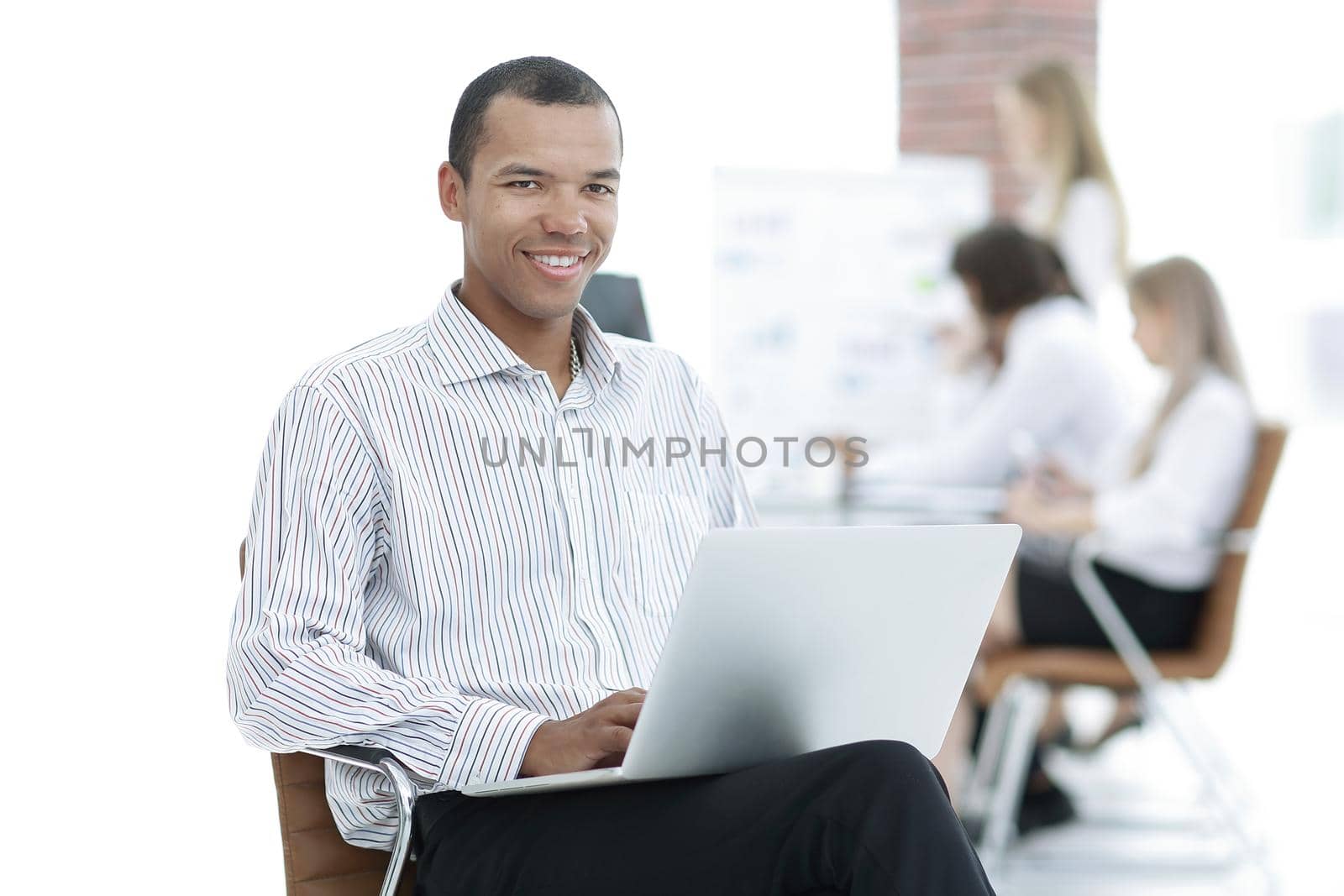 businessman typing on laptop.photo with copy space by SmartPhotoLab