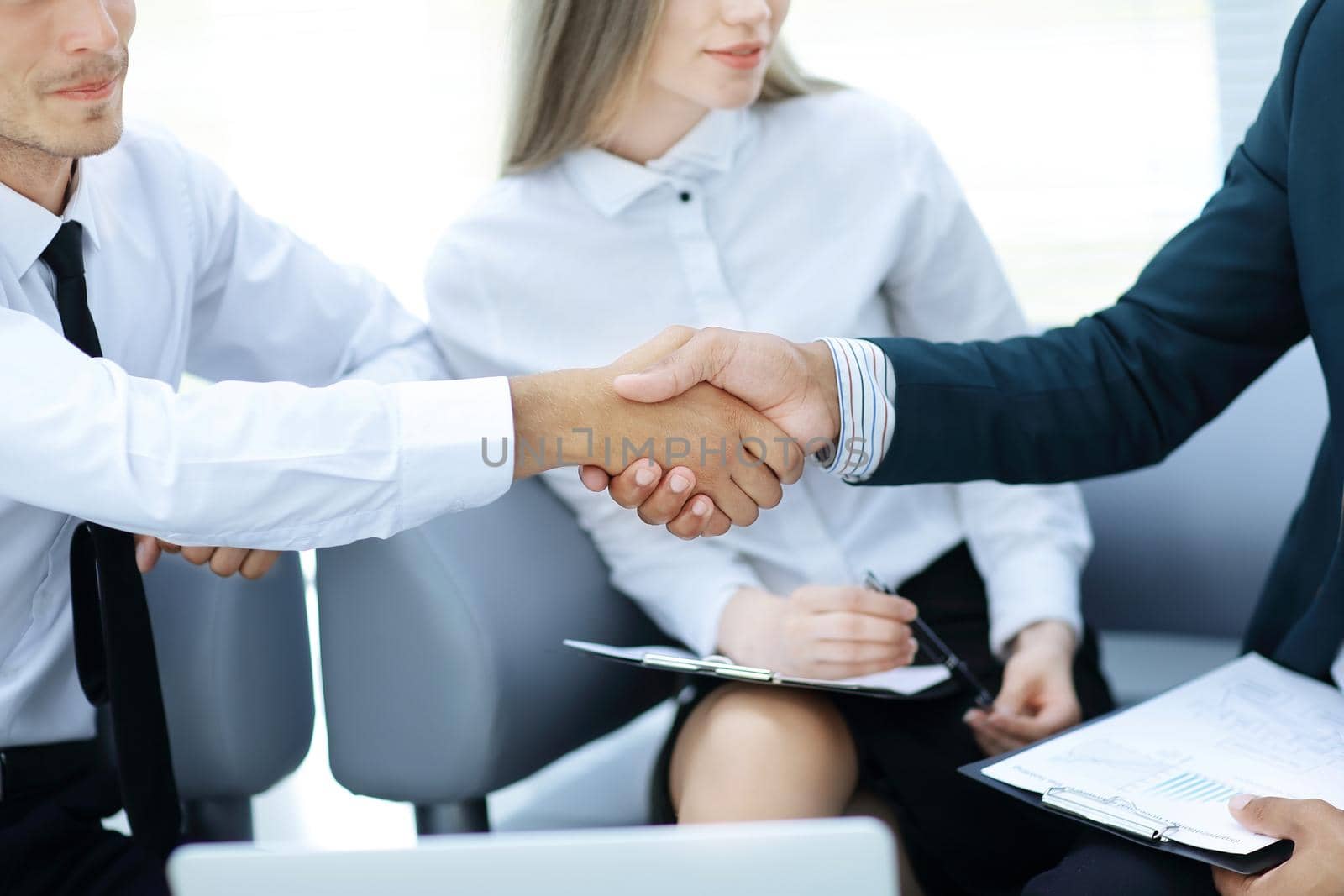 business partners greeting each other with a handshake.photo with copy space