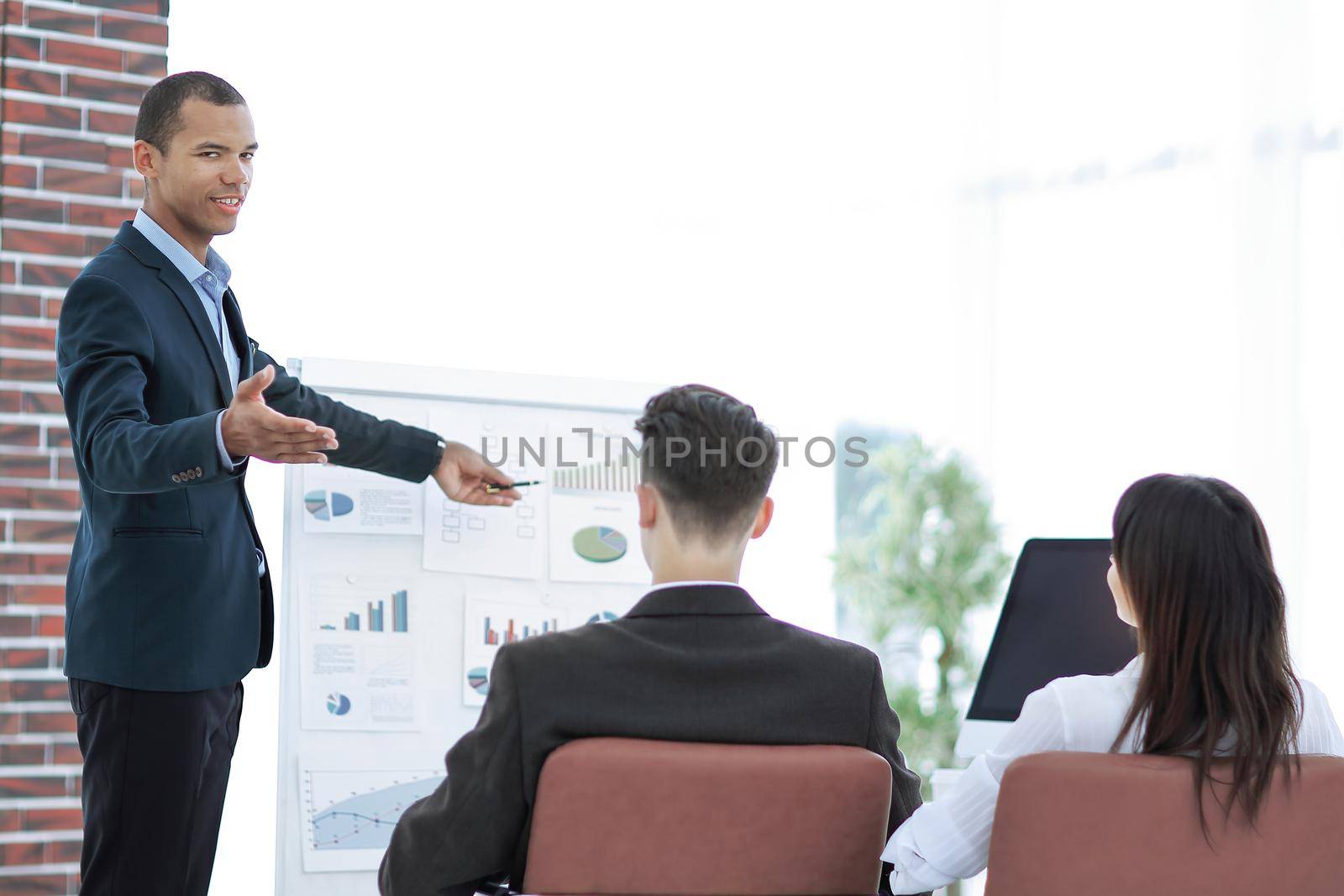 speaker makes a report on the presentation of the financial project .photo with copy space.