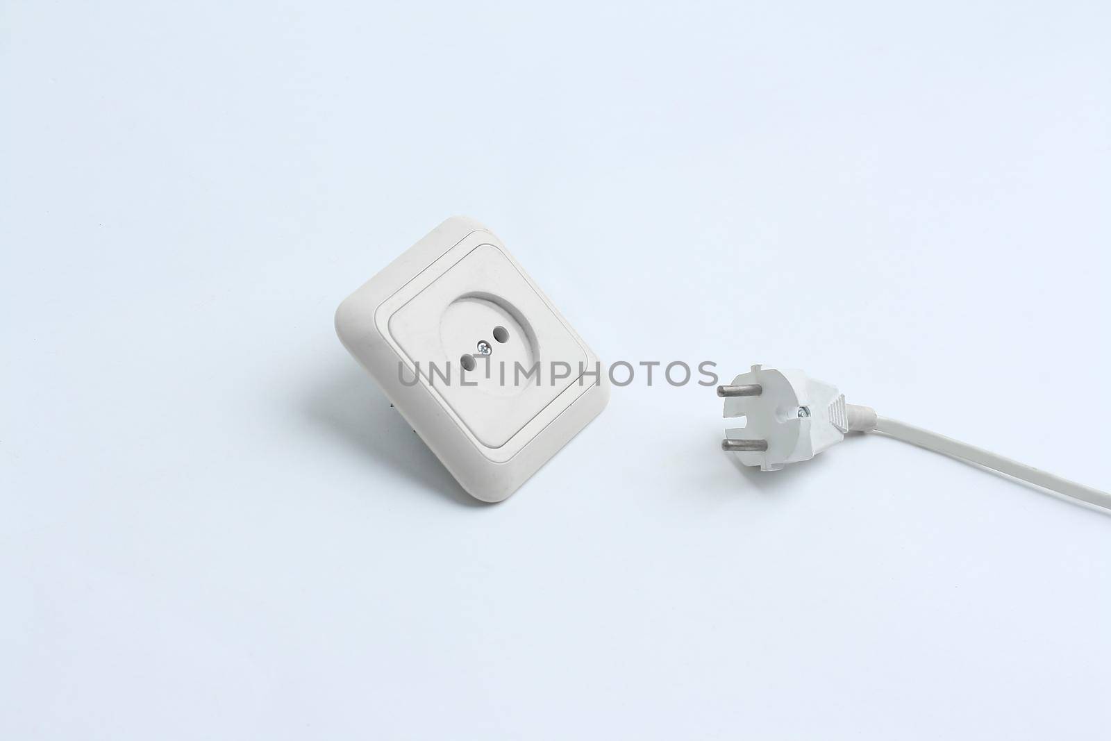 electrical outlet and plug.isolated on a white background by SmartPhotoLab