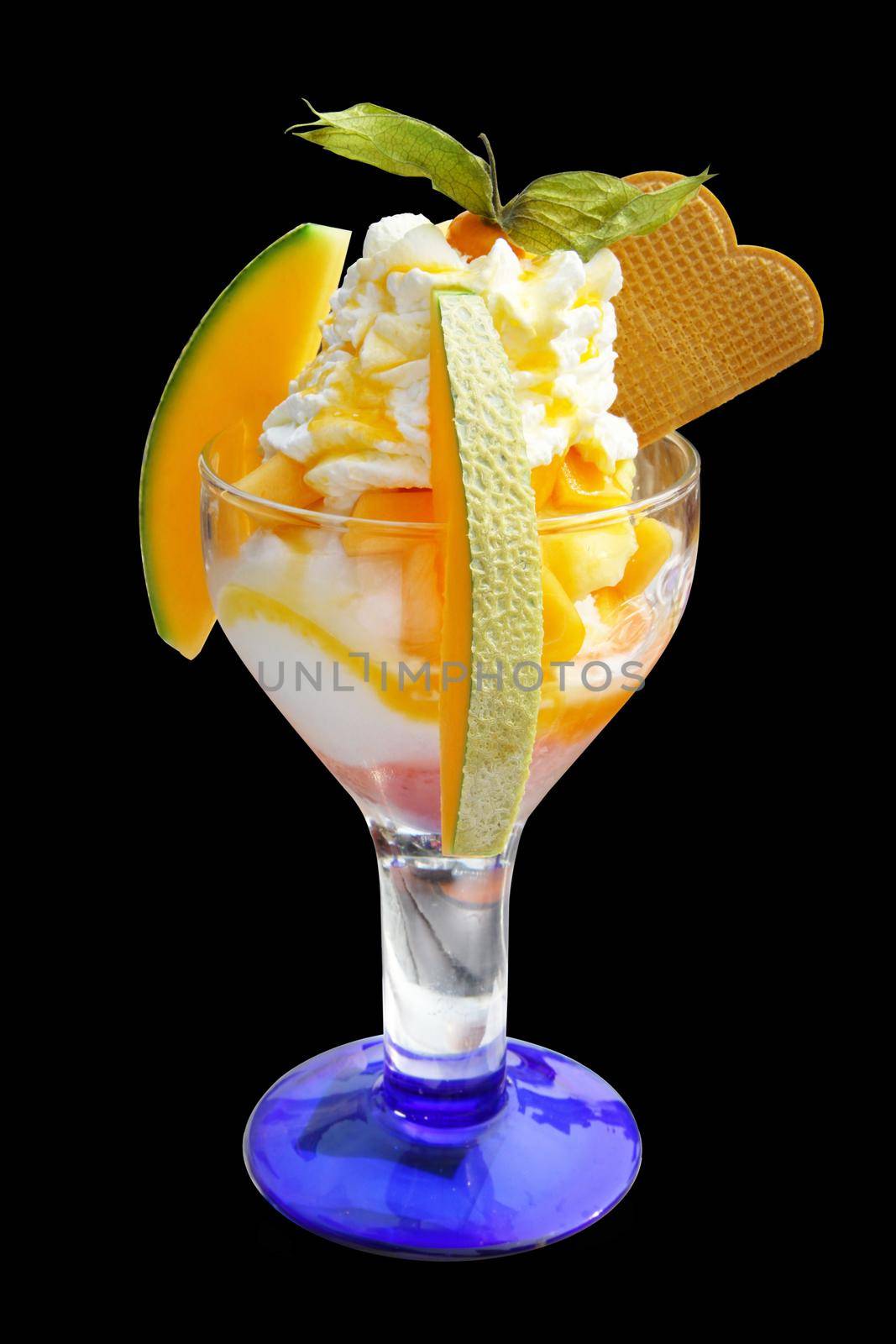 Delicious ice cream with melon and papaya. Healthy summer food concept. by Taut