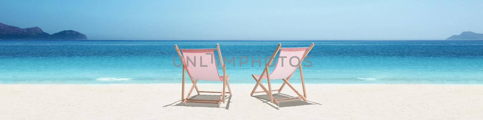 Relax on tropical beach in the sun on deck chairs. by Taut