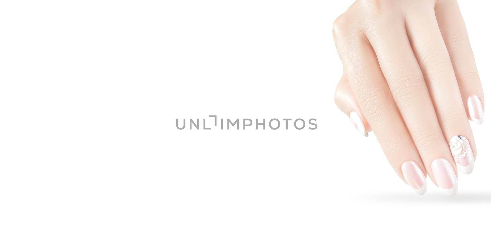 Young beautiful woman hands with elegant manicure by Taut