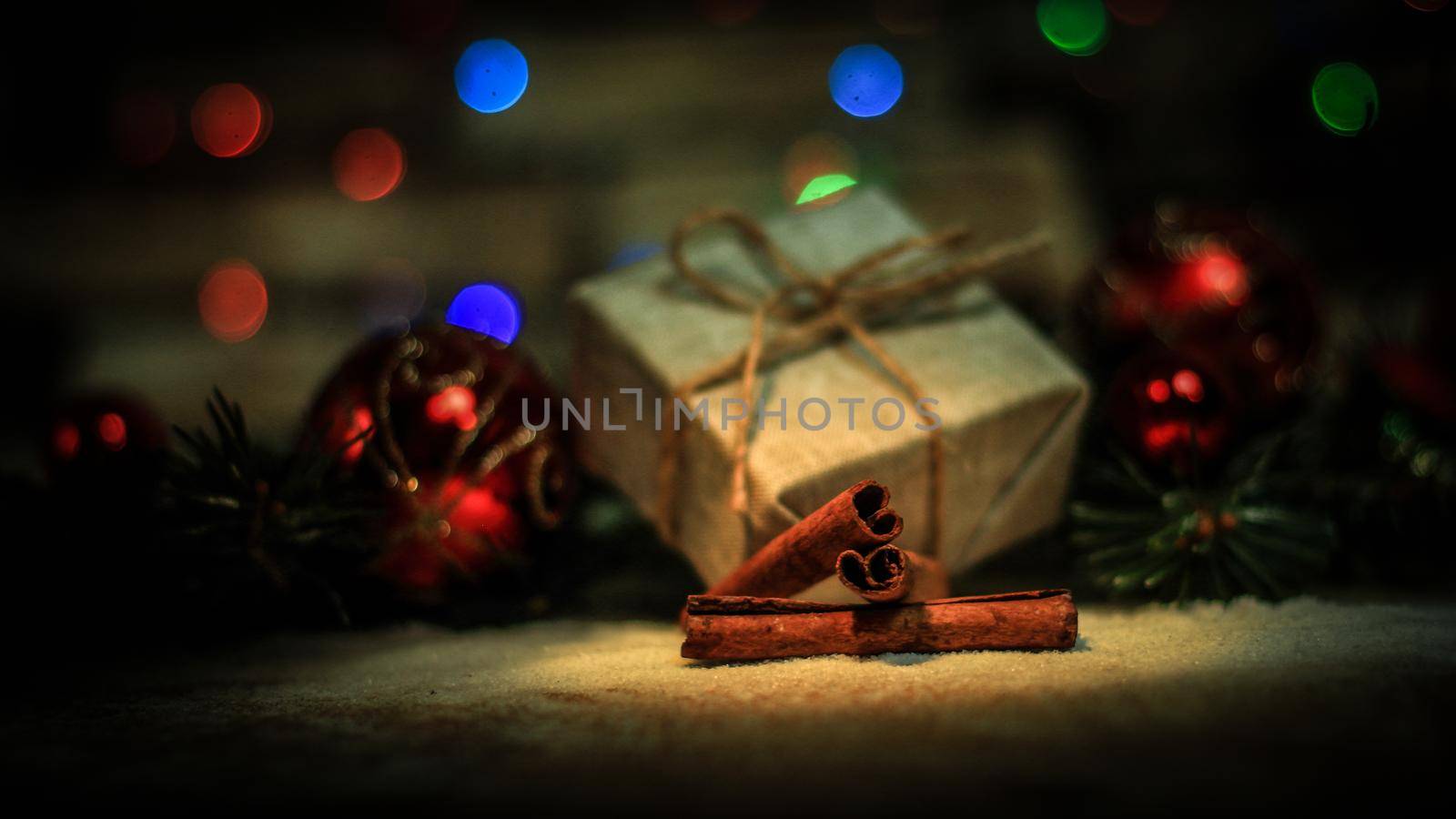 Christmas gift and Christmas tree decorations on the background of Christmas lights.photo with copy space.