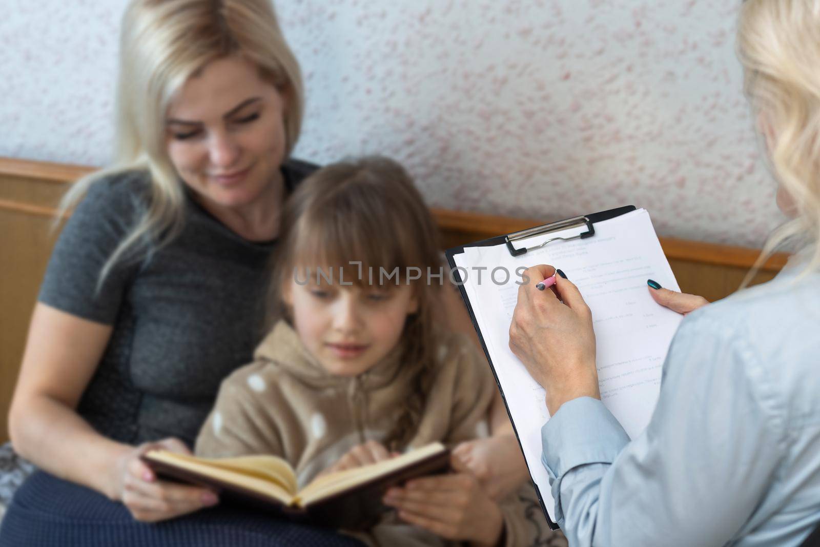 Talking is key to understanding. Parent and child seeing psychologist together. Counseling therapist and mother listening to preteen daughter sharing school news, telling story and answering questions