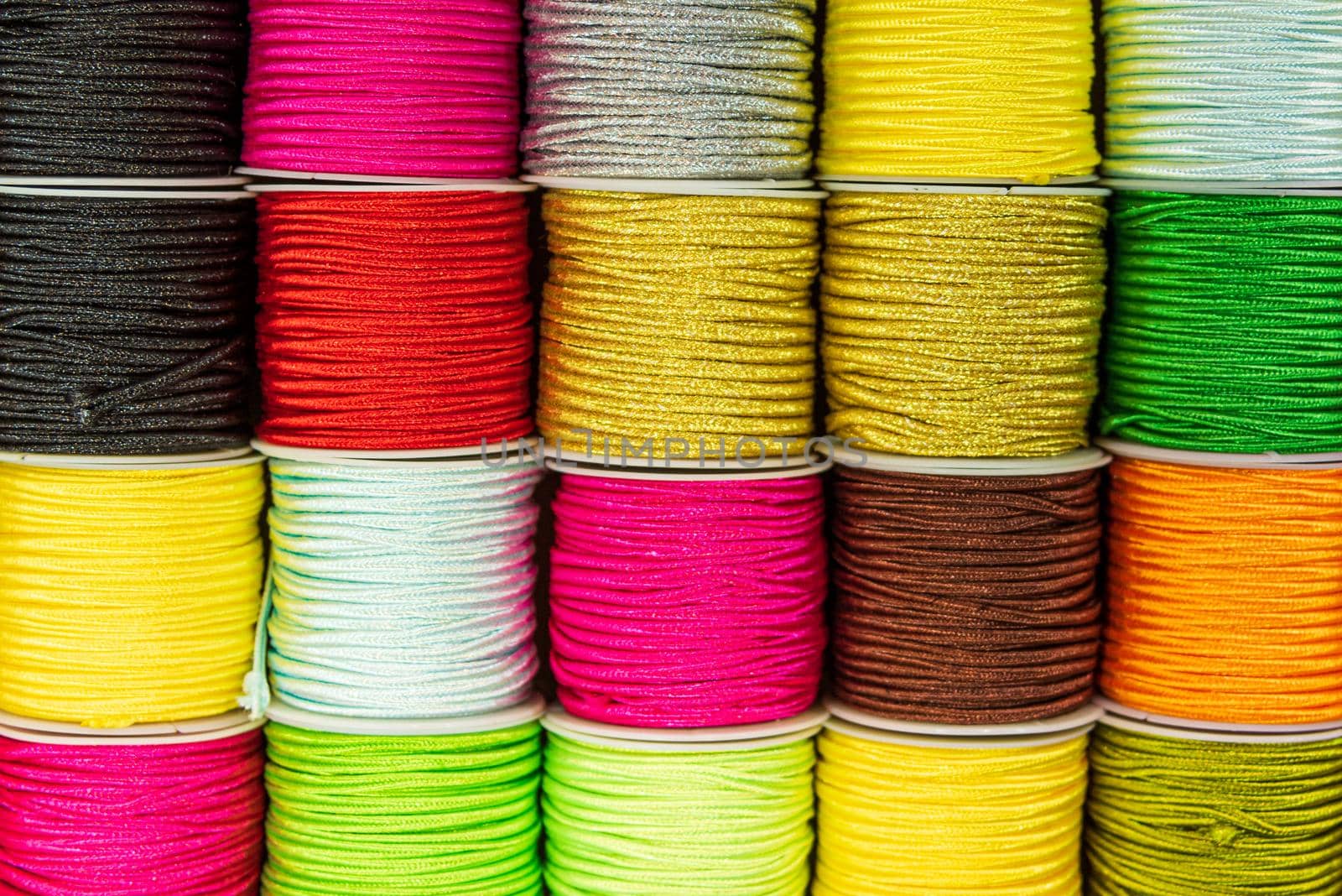 Ornamental threads for colorful jewelry making. High quality photo