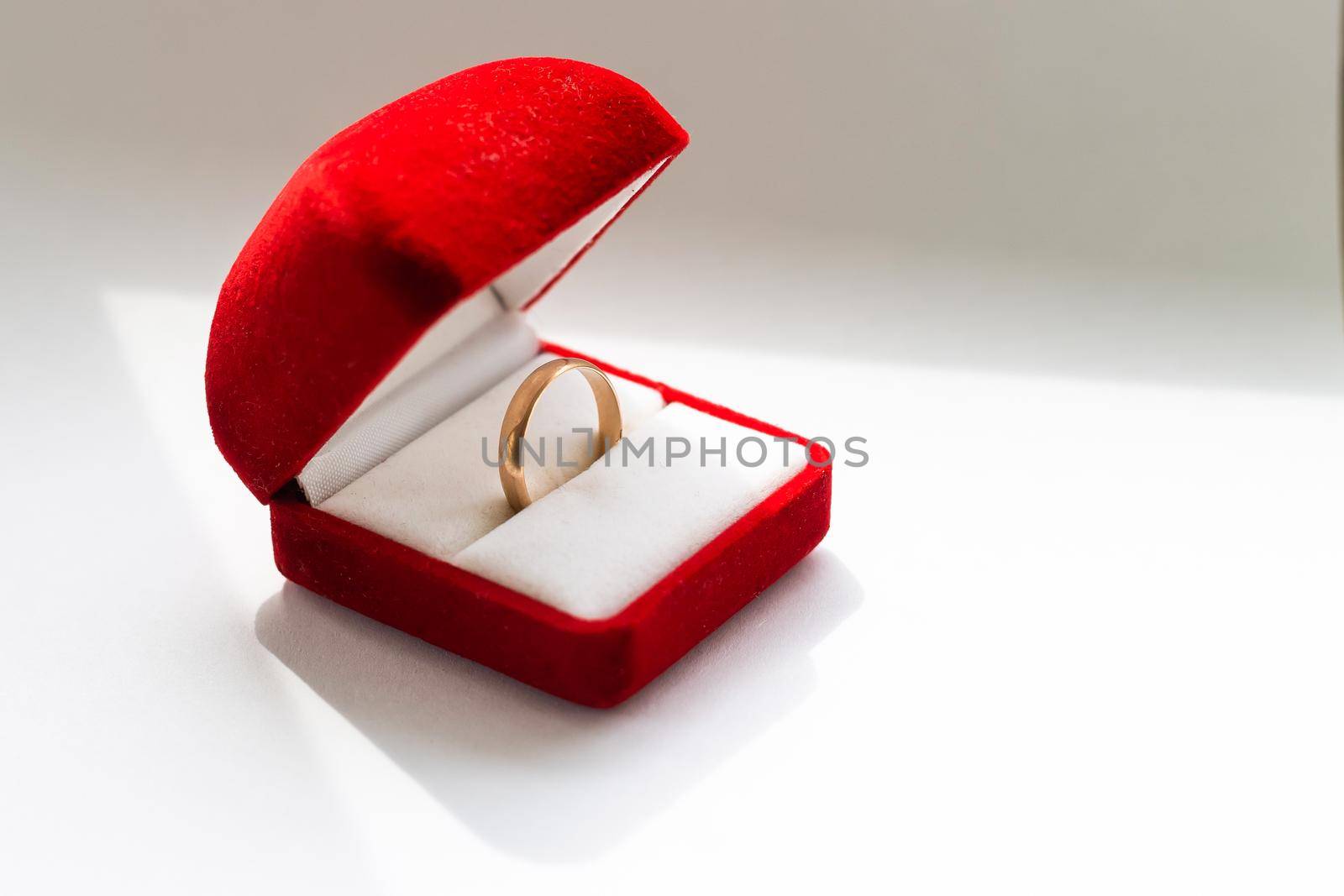 wedding ring in a red box.