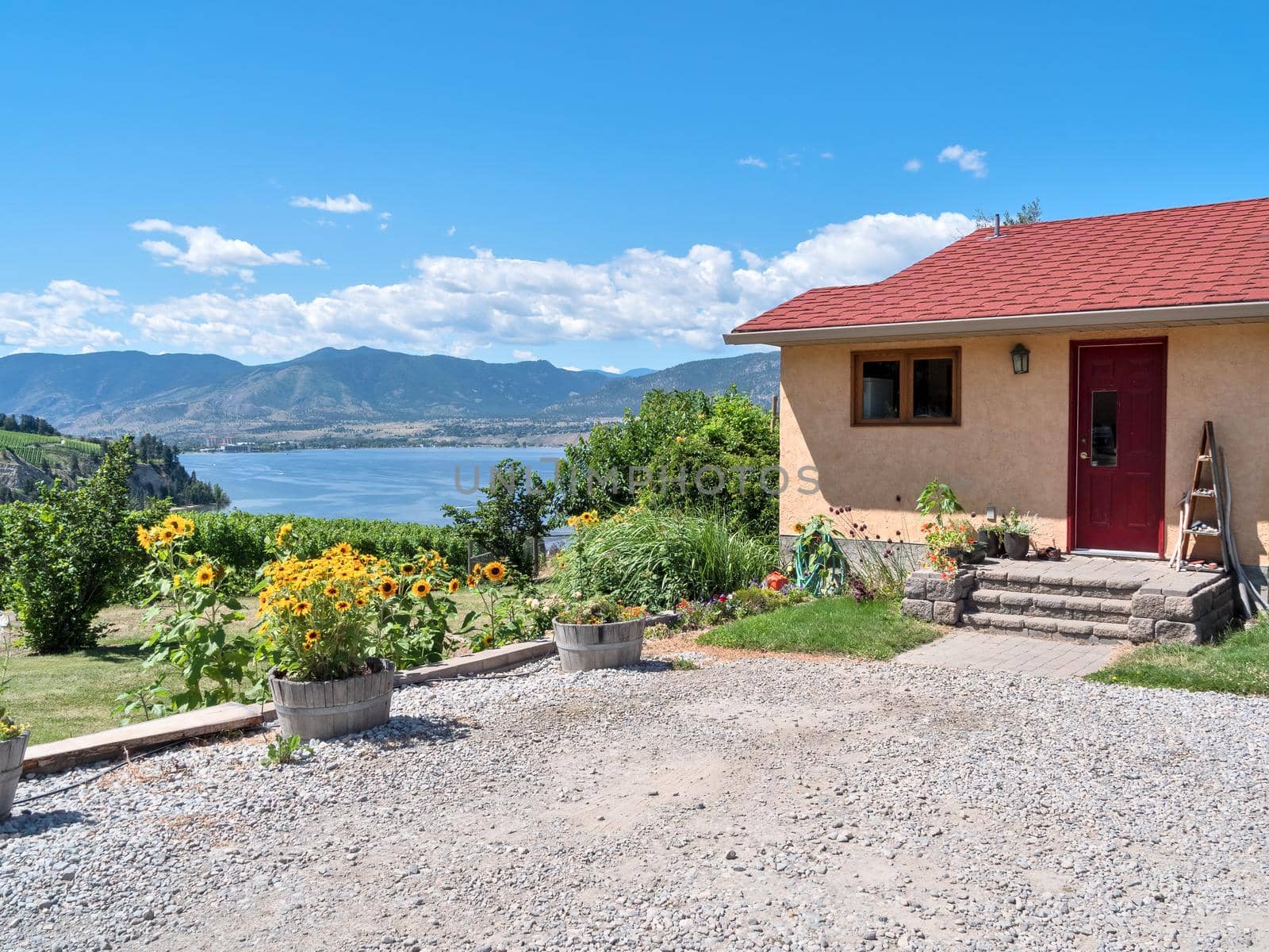 A perfect neighborhood. Residential house with beautiful overview of the lake and mountains in Okanagan valley.