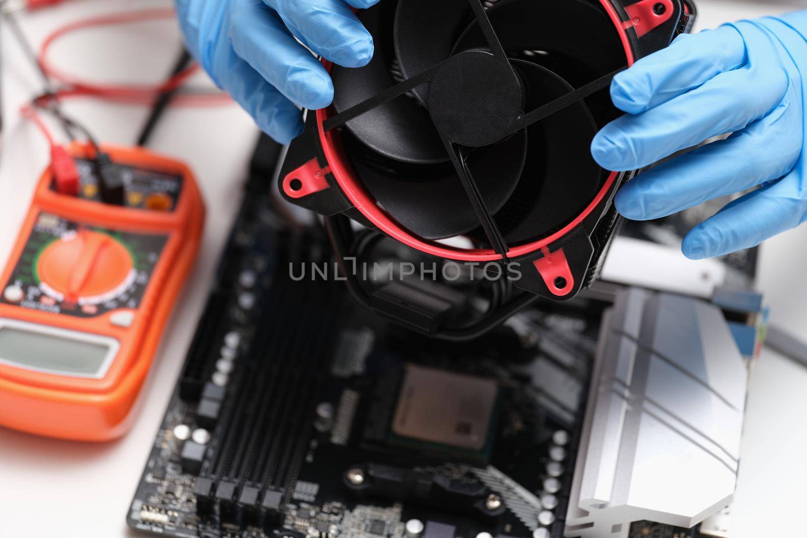 Cleaning and repairing personal computer and replacing or installing fan. Computer service and maintenance.