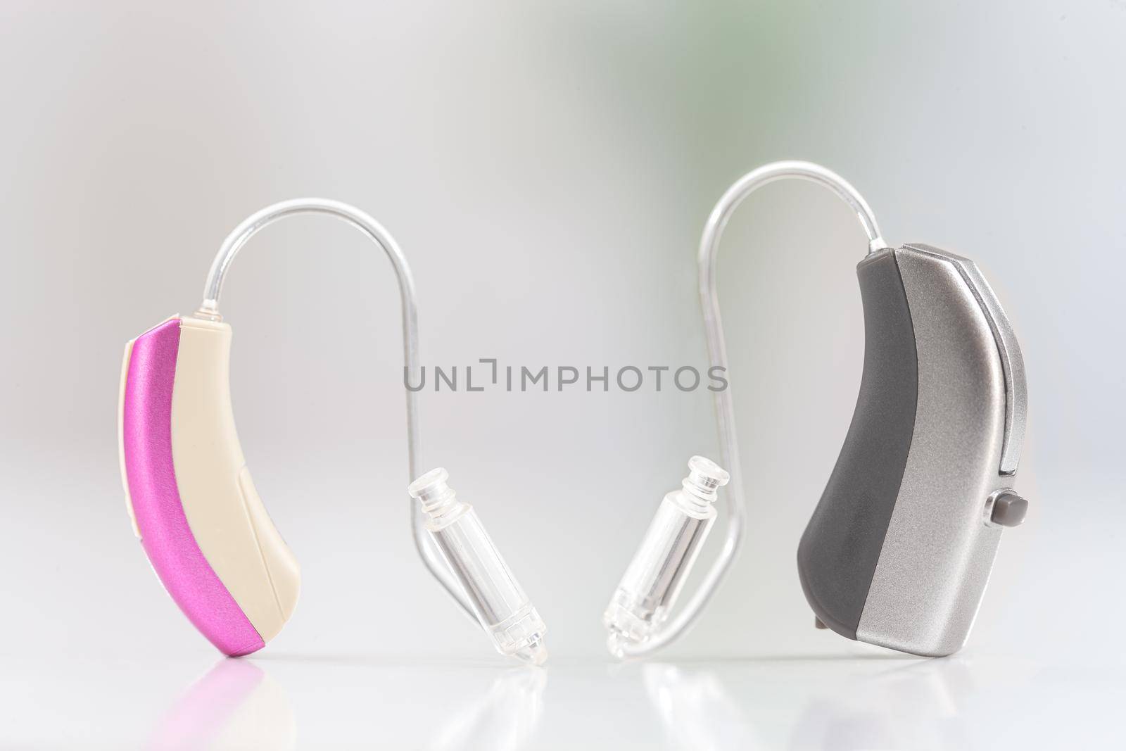 Hearing aids in close-up on a light background