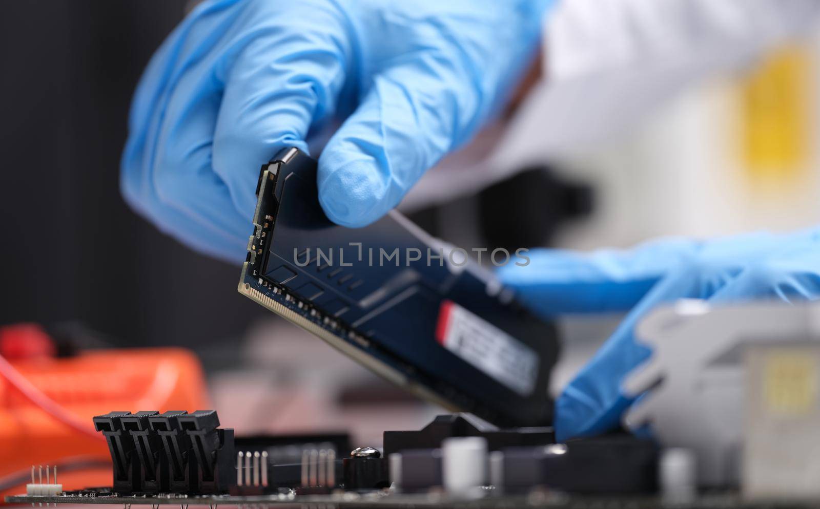 Installation of new RAM or processor of personal computer in service. Computer equipment upgrade and repair
