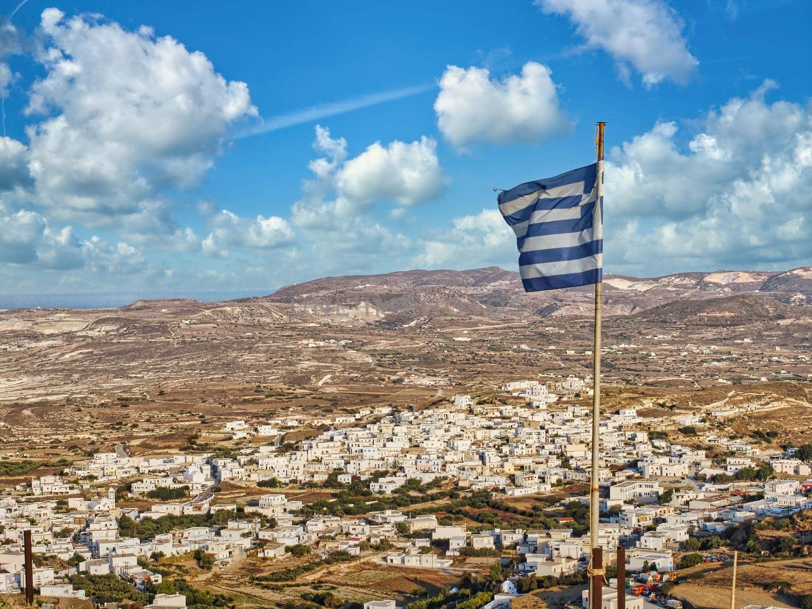 Panoramic view of the picturesque village of Plaka on the island of Milos, famous village for traditional houses and great view of the sea