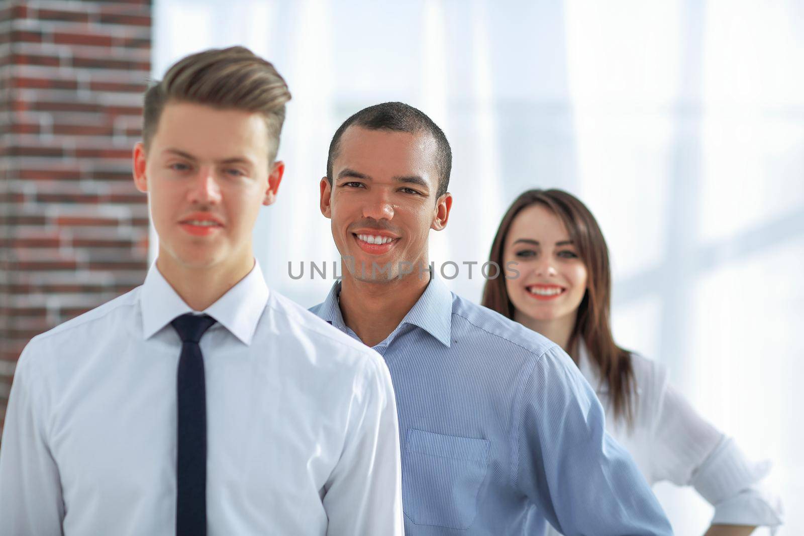 portrait international business team in the background of the office.the concept of teamwork