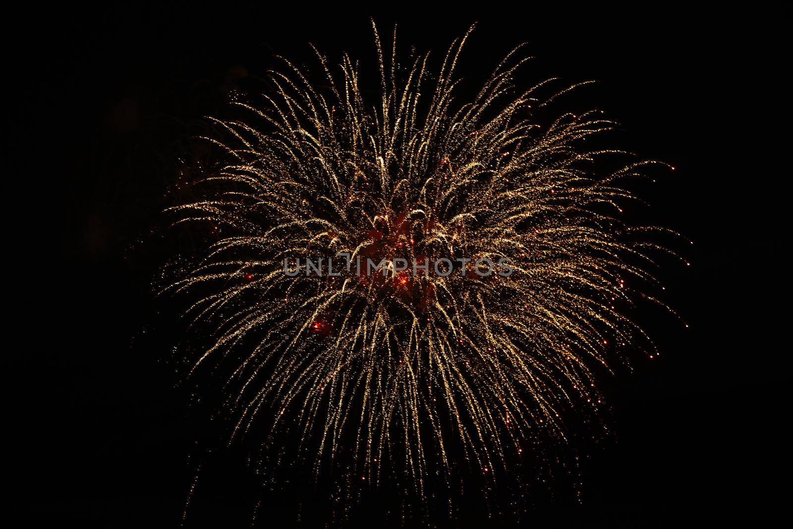 New Year celebration fireworks. Fourth of July Fireworks. Fireworks light up the sky with dazzling display. glowing fireworks show.