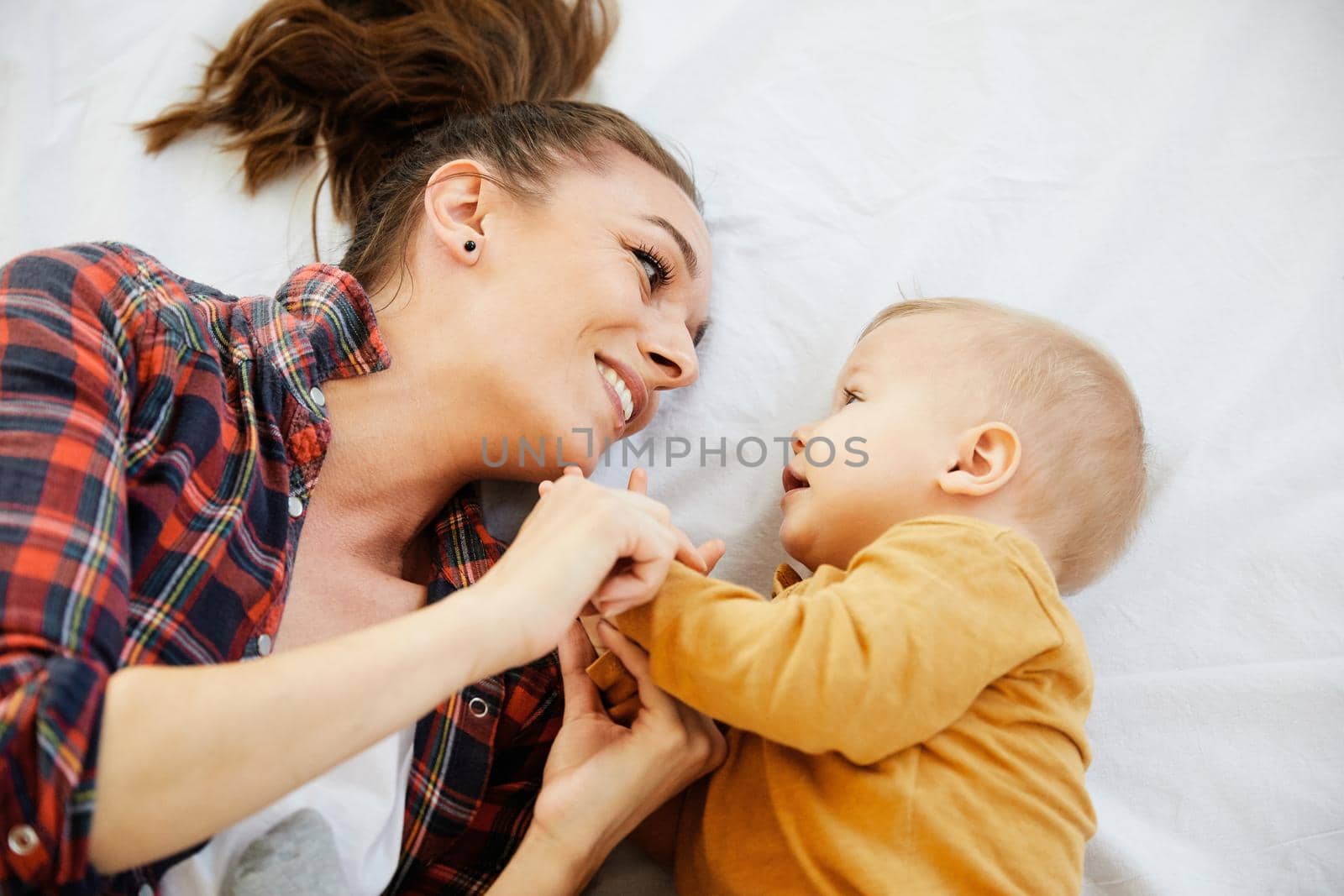 Portrait of a mother and son having fun together at home