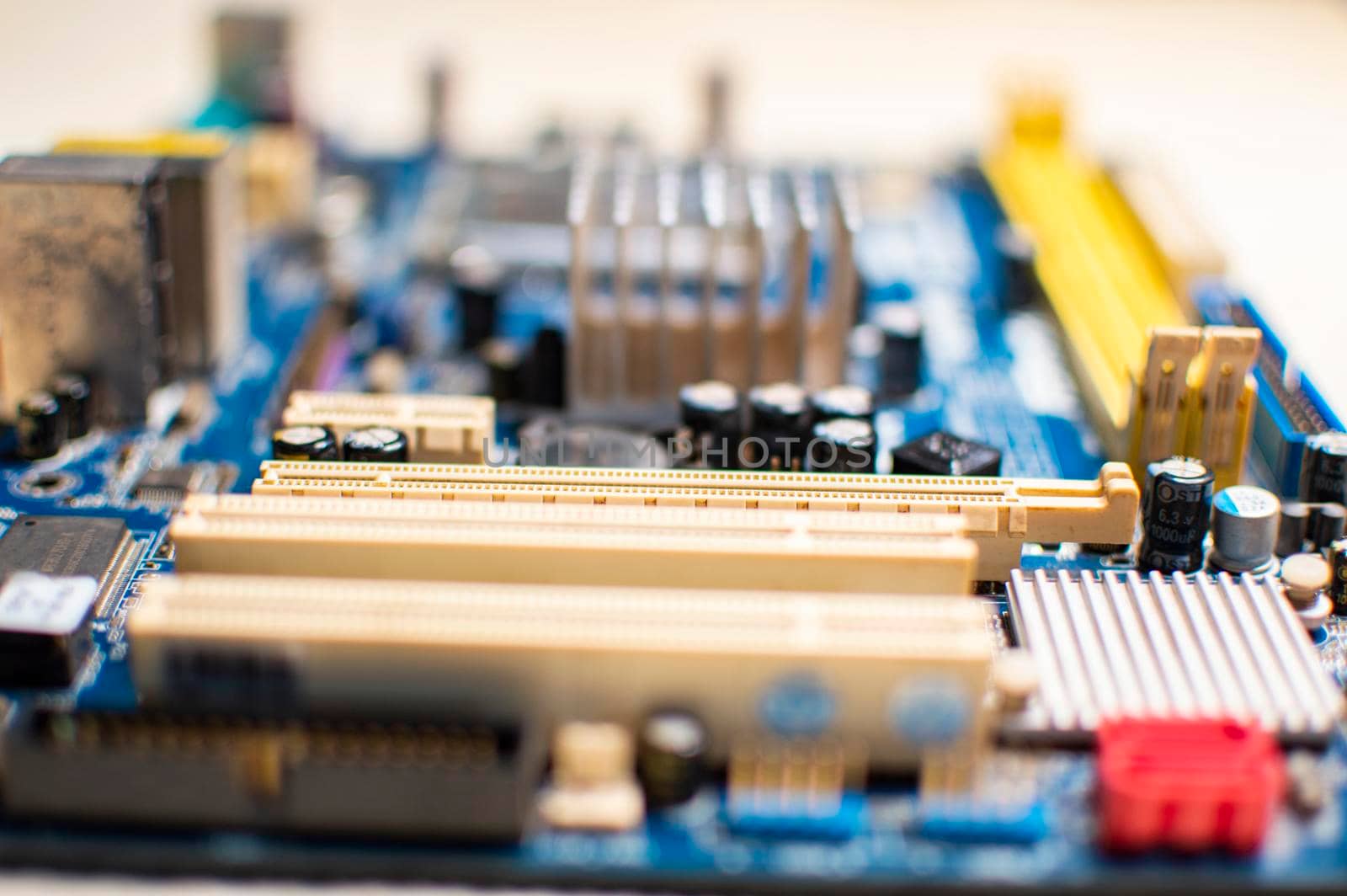 Close up of a motherboard, details of a computer motherboard, detail of a motherboard socket by isaiphoto