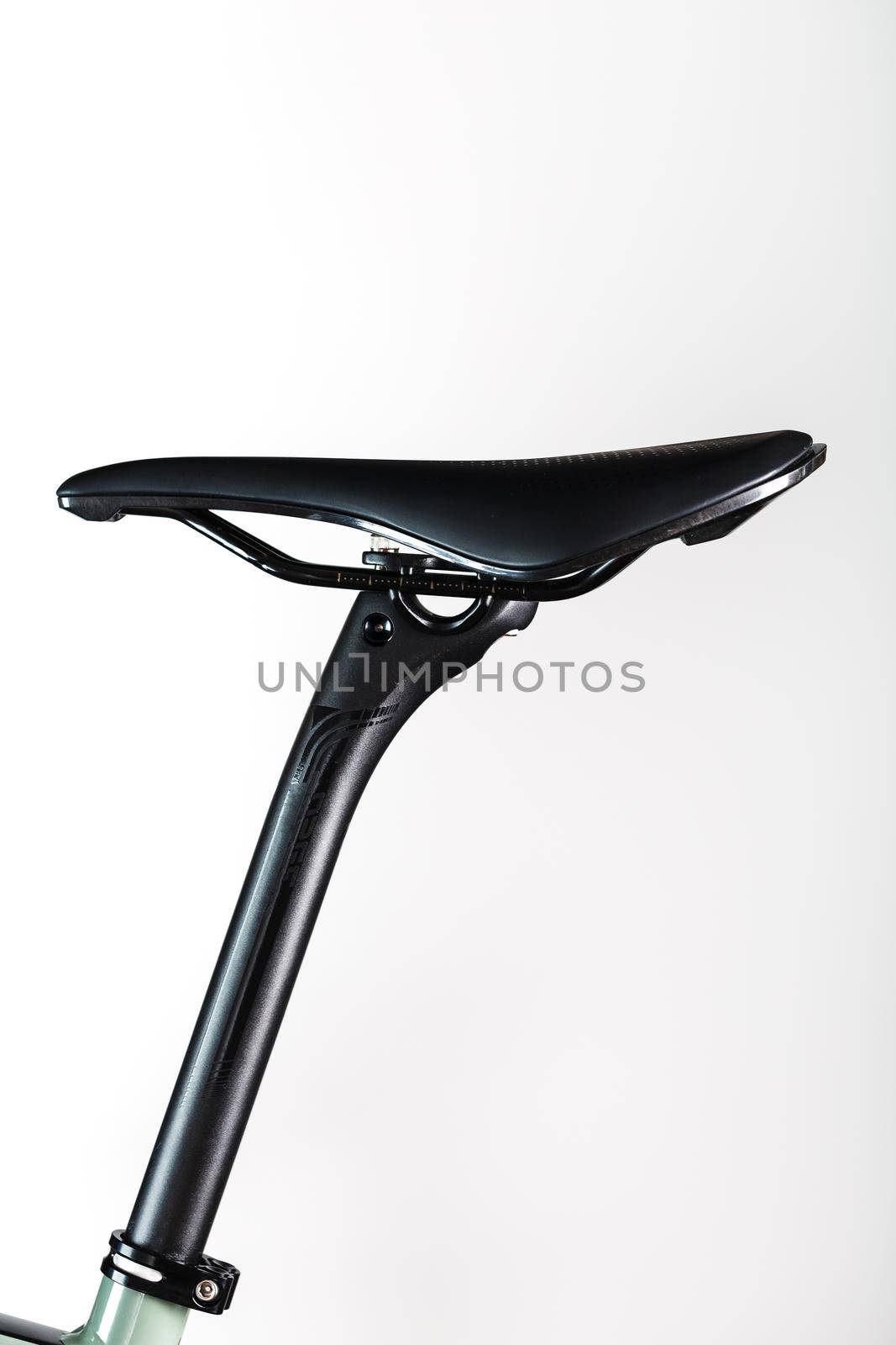 Bicycle saddle on a light background accessories for bike repair and tuning by AlexGrec