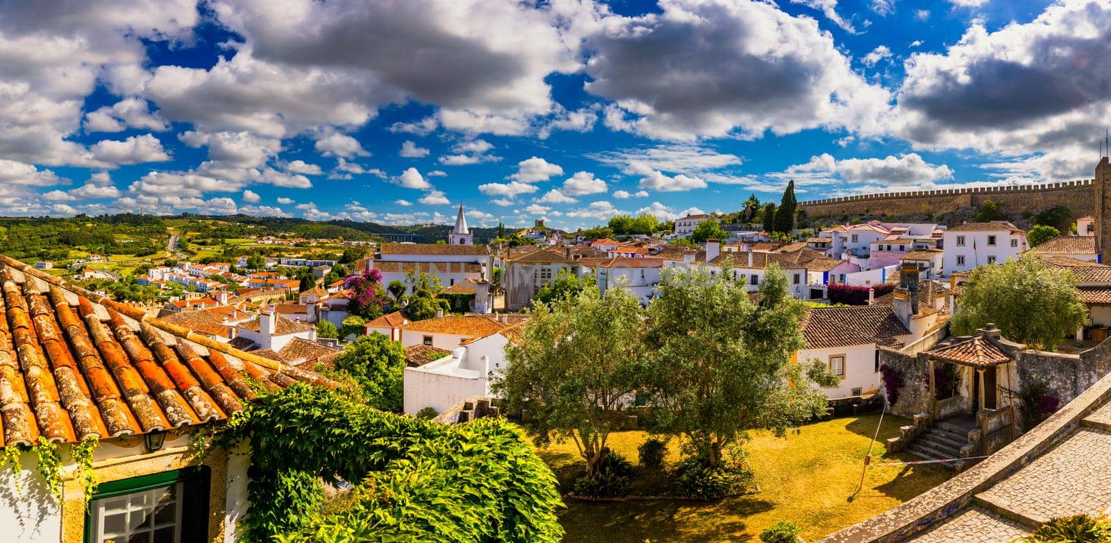 Obidos, Portugal stonewalled city with medieval fortress, historic walled town of Obidos, near Lisbon, Portugal. Beautiful view of Obidos Medieval Town, Portugal. 