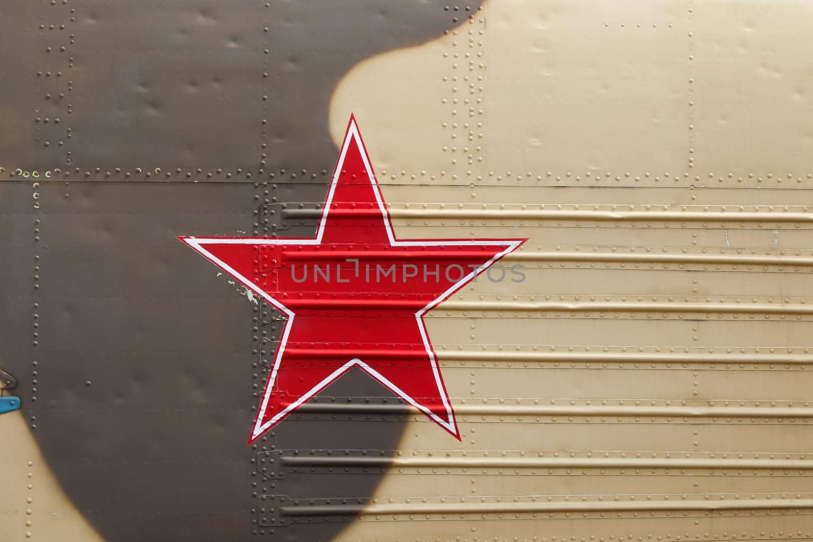 Russian Red Star On Camouflaged Helicopter Fuselage by jjvanginkel