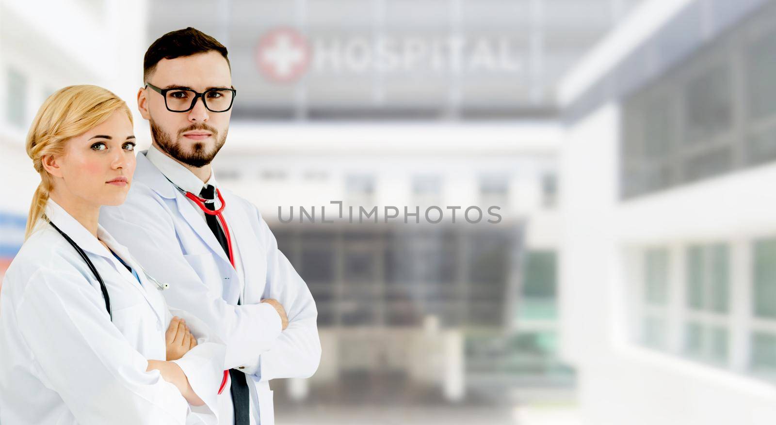 Doctor working with another doctor in the hospital. Healthcare and medical service.