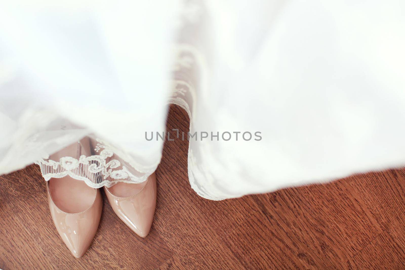 Beautiful wedding shoes under the dress by IvanGalashchuk