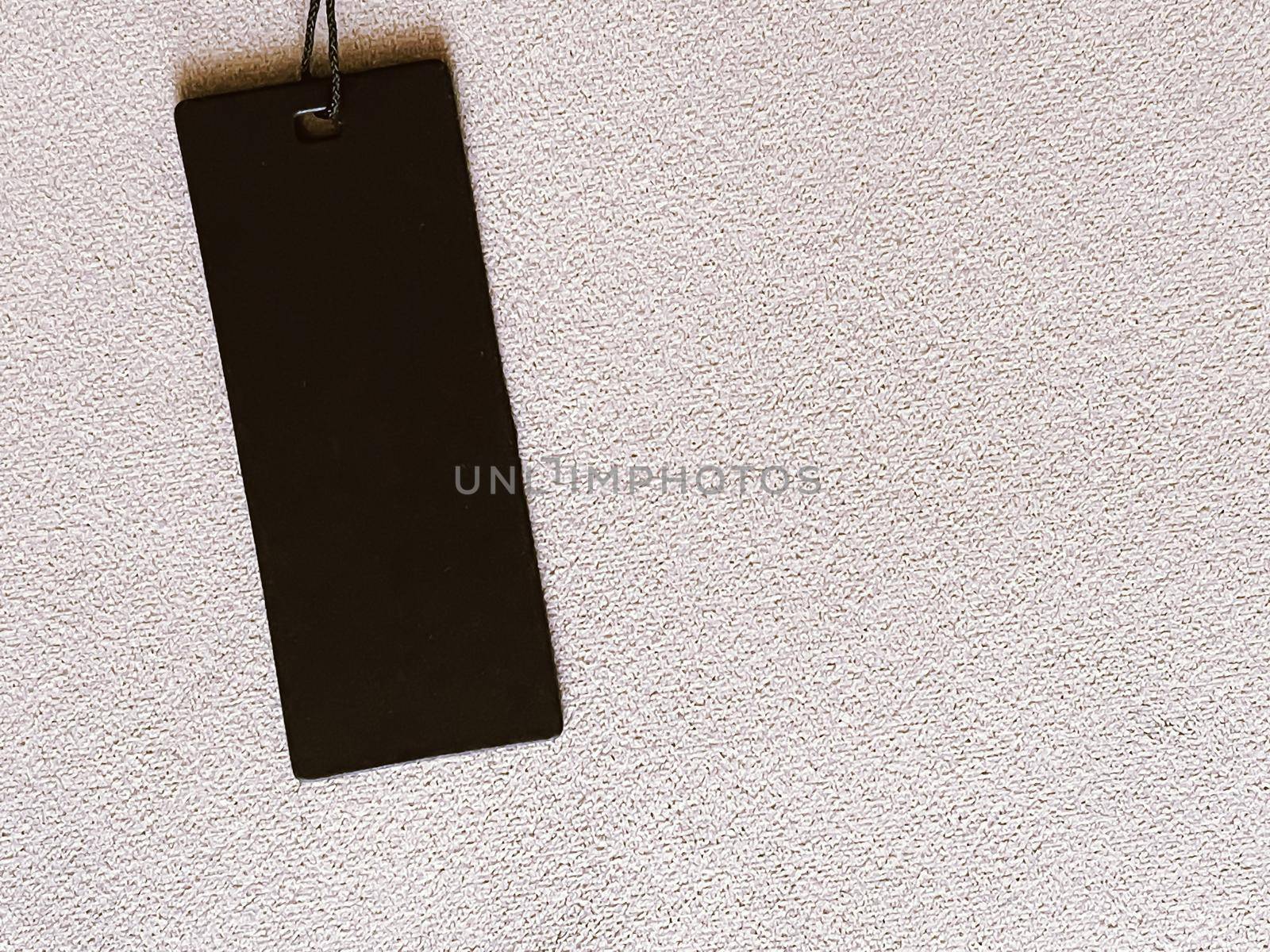 Luxury black fashion label tag, sale price card on fabric background, shopping and retail concept