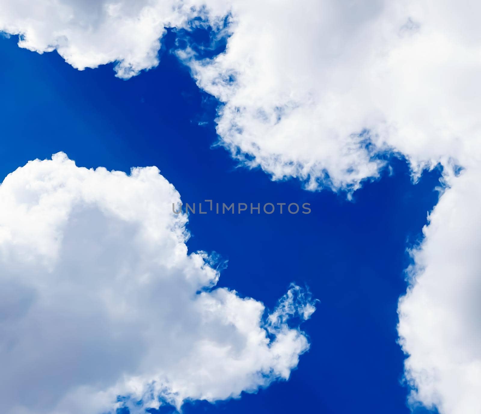 Cloudy sunny sky as abstract background, bright colours, beauty in nature by Anneleven