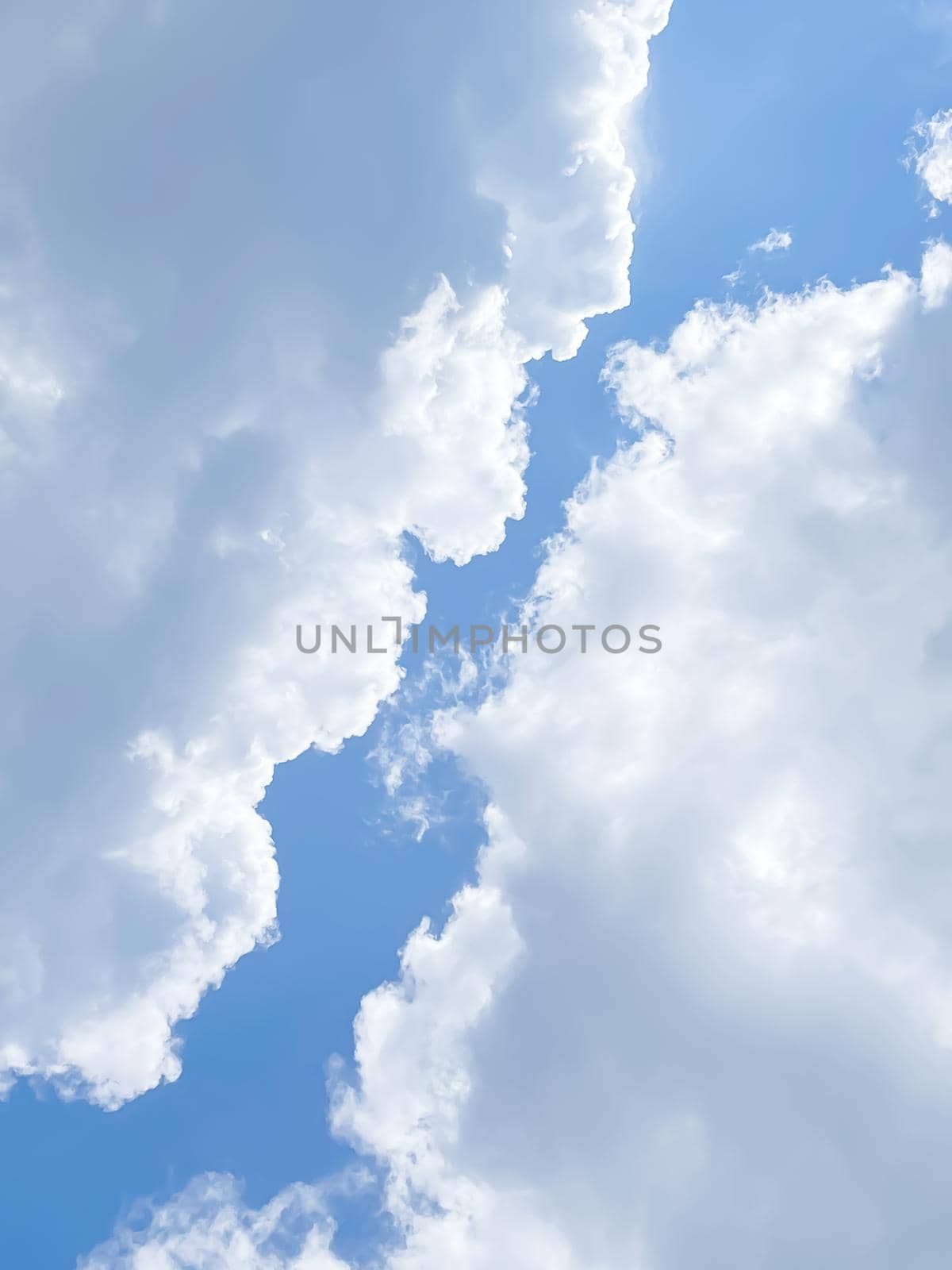 Cloudy sunny sky as abstract background, bright colours, beauty in nature concept