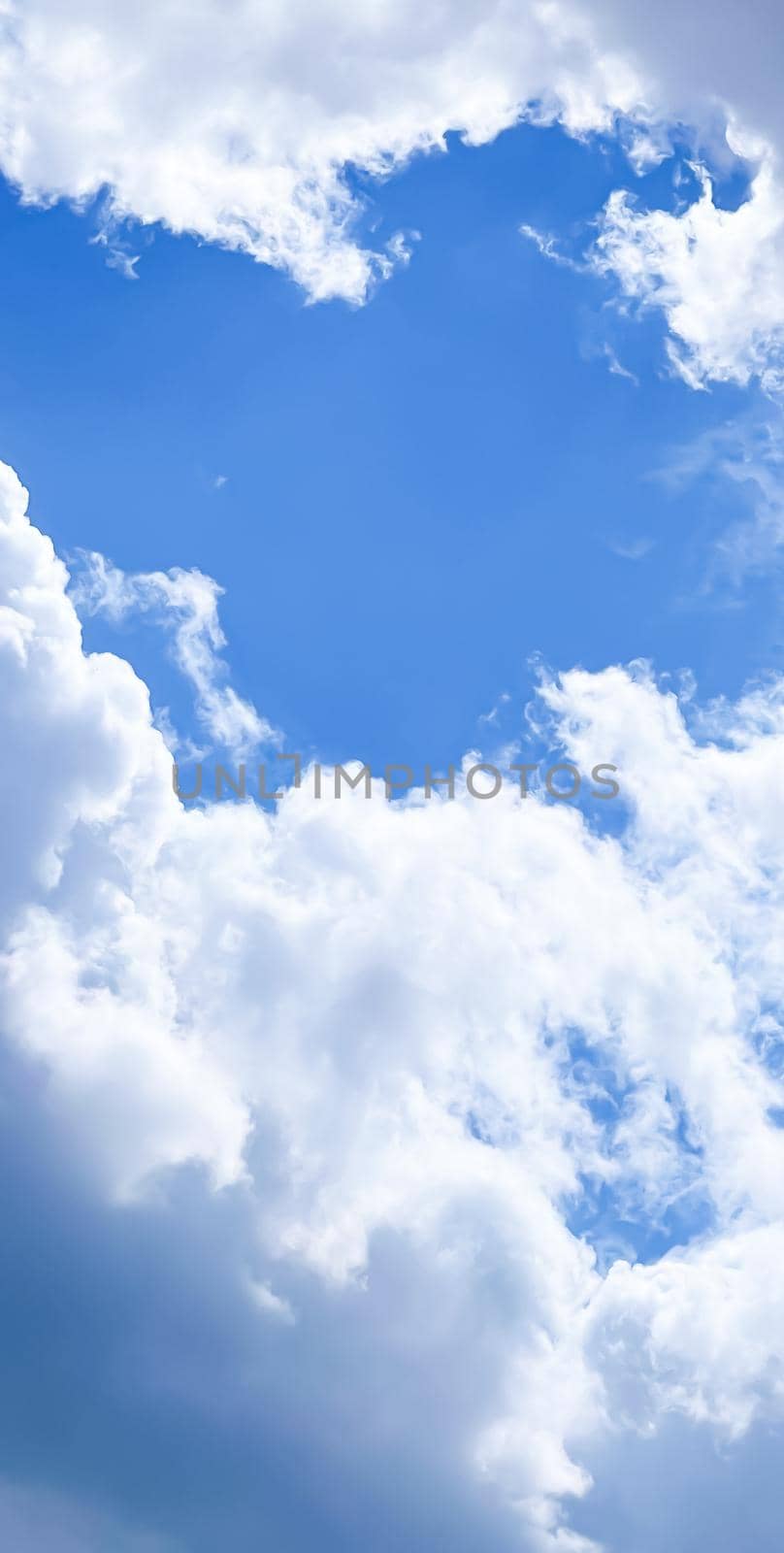 Cloudy sunny sky as abstract background, bright colours, beauty in nature by Anneleven