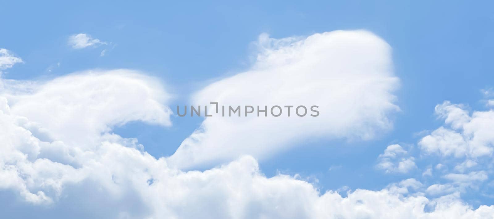 Cloudy sunny sky as abstract background, bright colours, beauty in nature concept