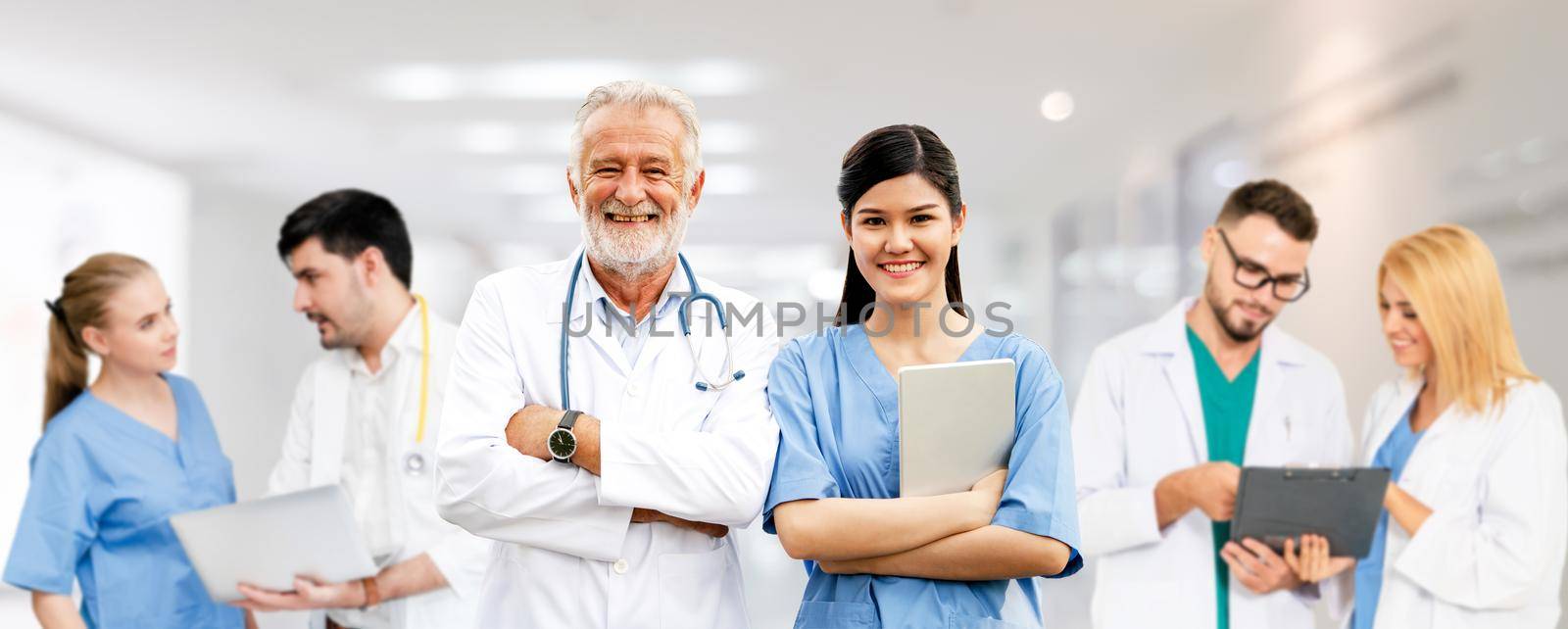 Healthcare people group. Professional doctor working in hospital office or clinic with other doctors, nurse and surgeon. Medical technology research institute and doctor staff service concept.