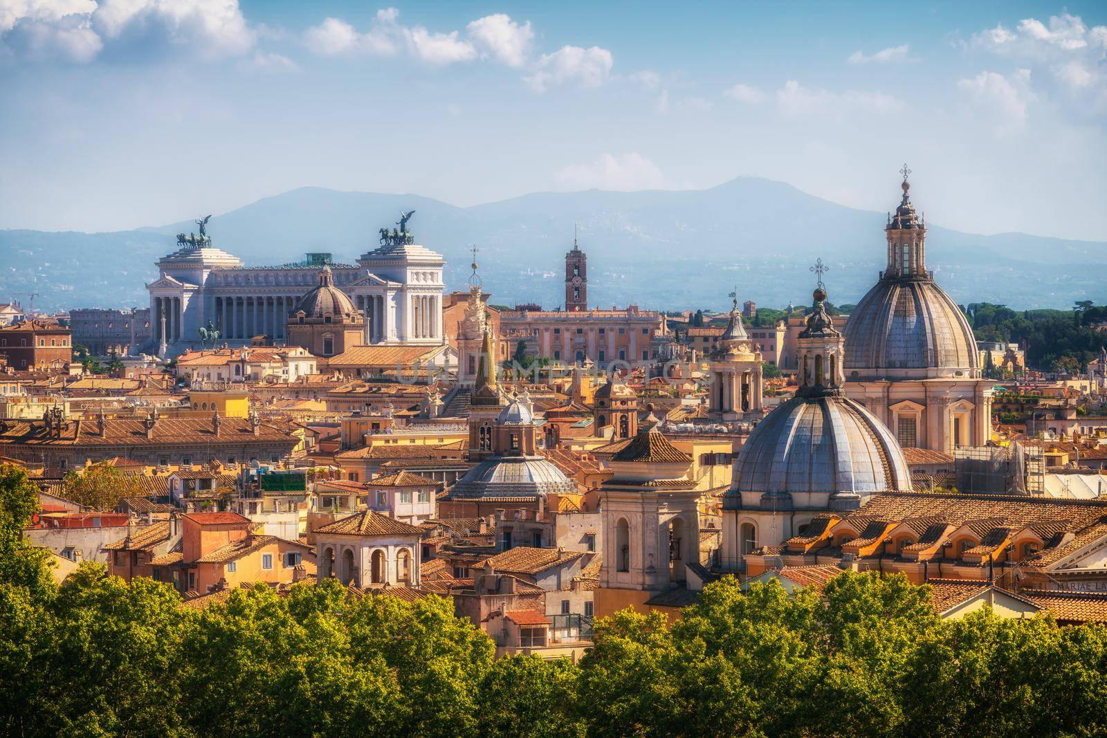 Rome skyline at the city center with panoramic view of famous landmark of Ancient Rome architecture, Italian culture and monuments. Historical Rome is the famous travel destination of Italy.
