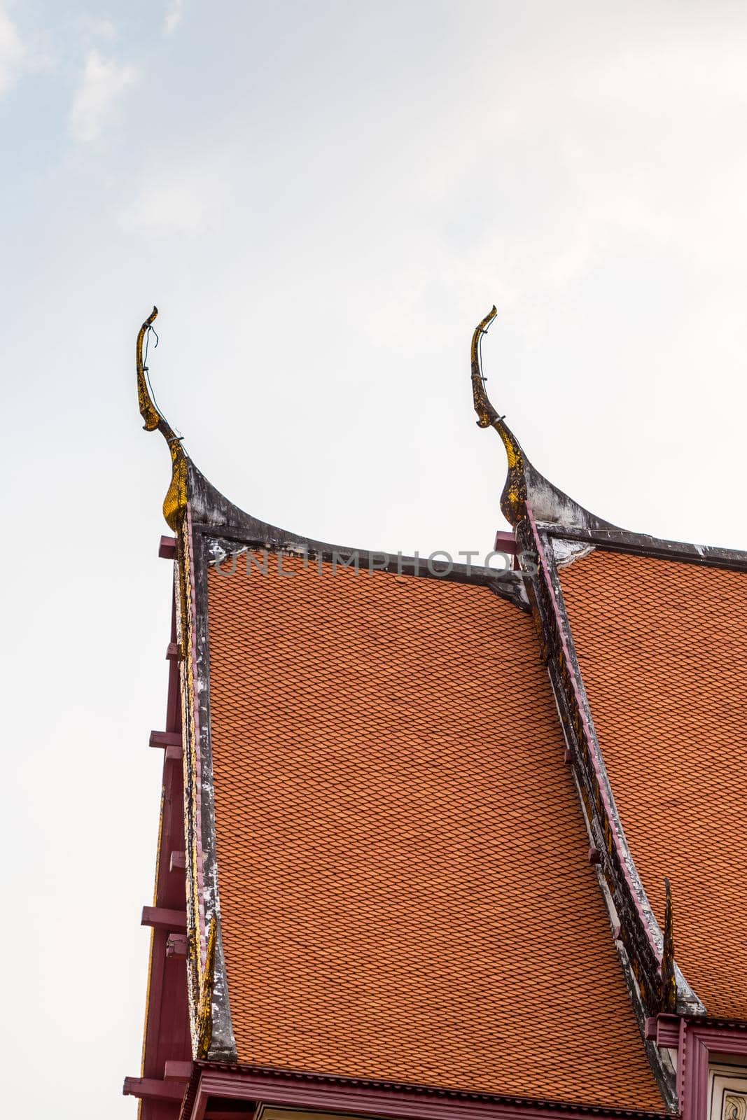 Gable apex on the gable of the temple roof by Satakorn