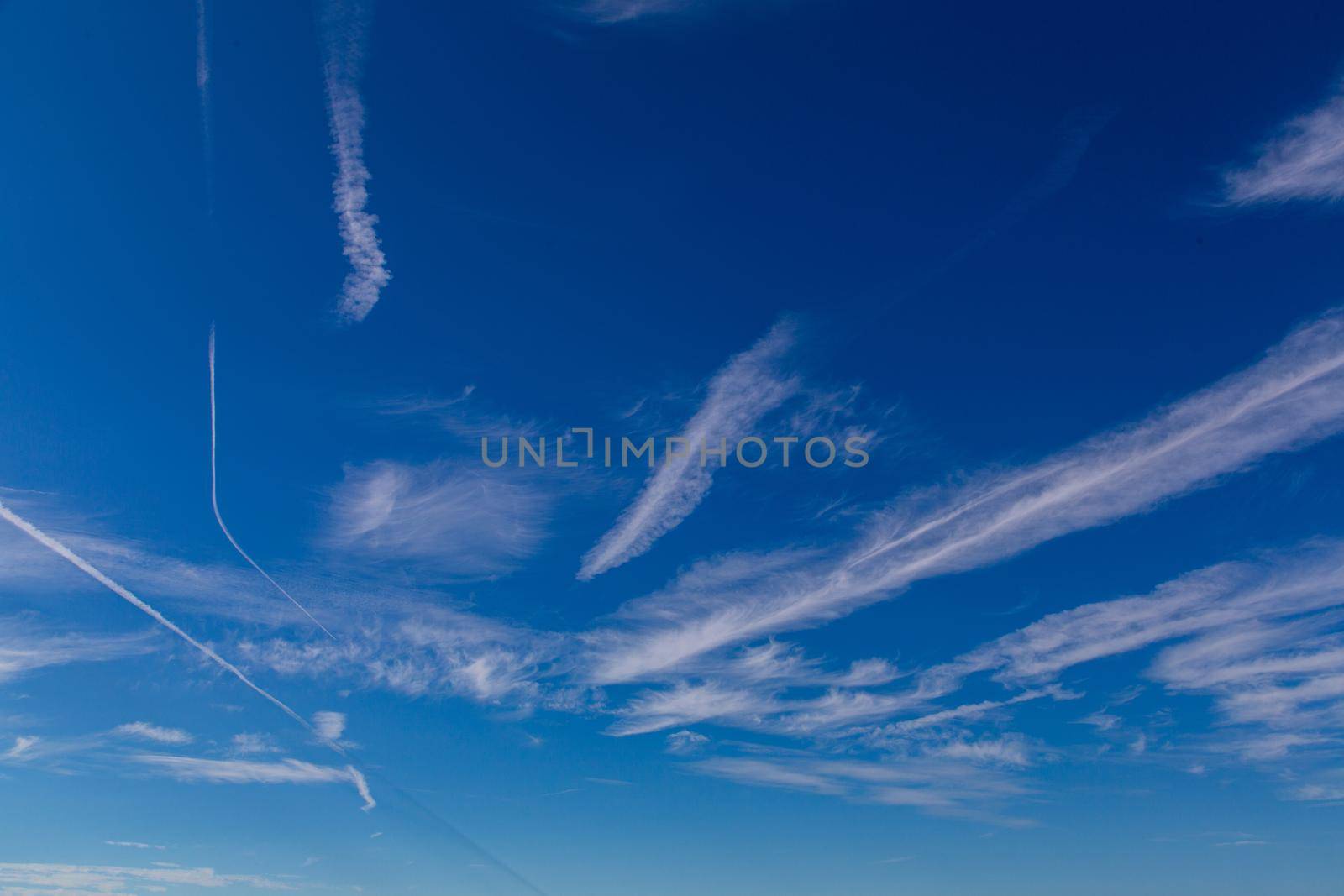 White clouds and stripes in the blue sky