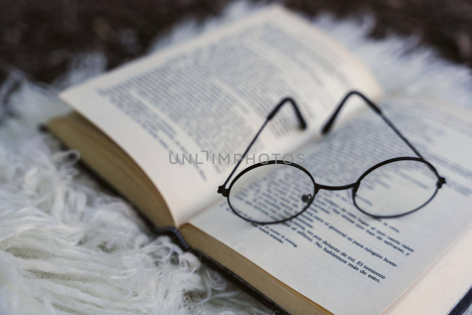 vintage glasses,on books stack in public library book, Studying examining. Tutor books with friends. Young students . High quality photo