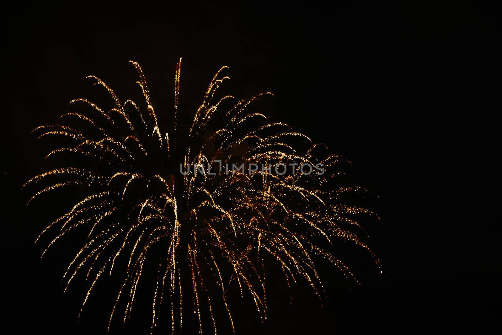 Golden salute Isolated on a black background. Celebrating July 4th - Independence Day. Copy space for your text.