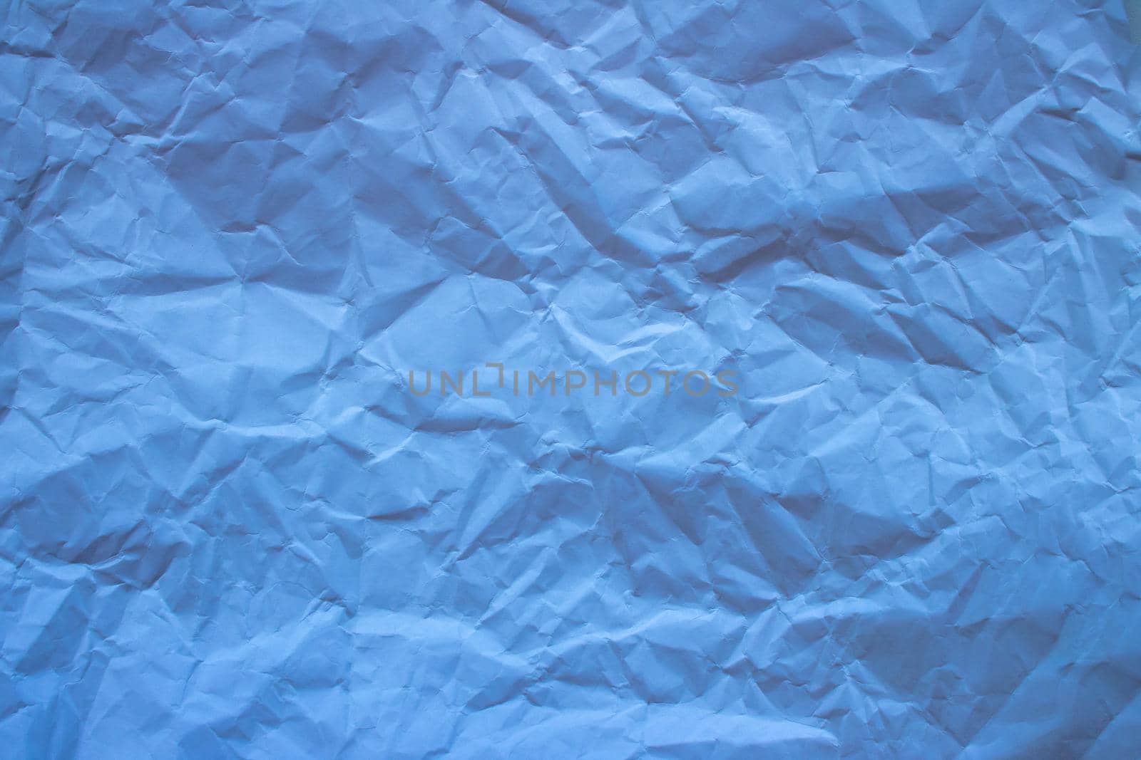 light blue trendy paper texture. Crumpled paper in light blue color