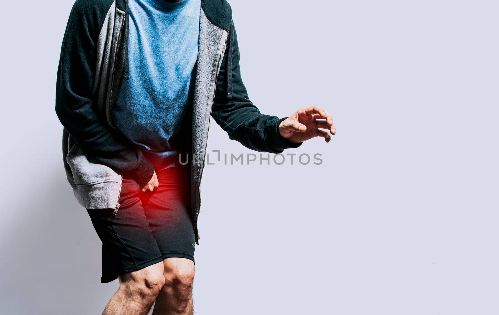 Person with urinary incontinence. Medical problem, Close up of person with crotch pain, concept of people with urinary problems by isaiphoto
