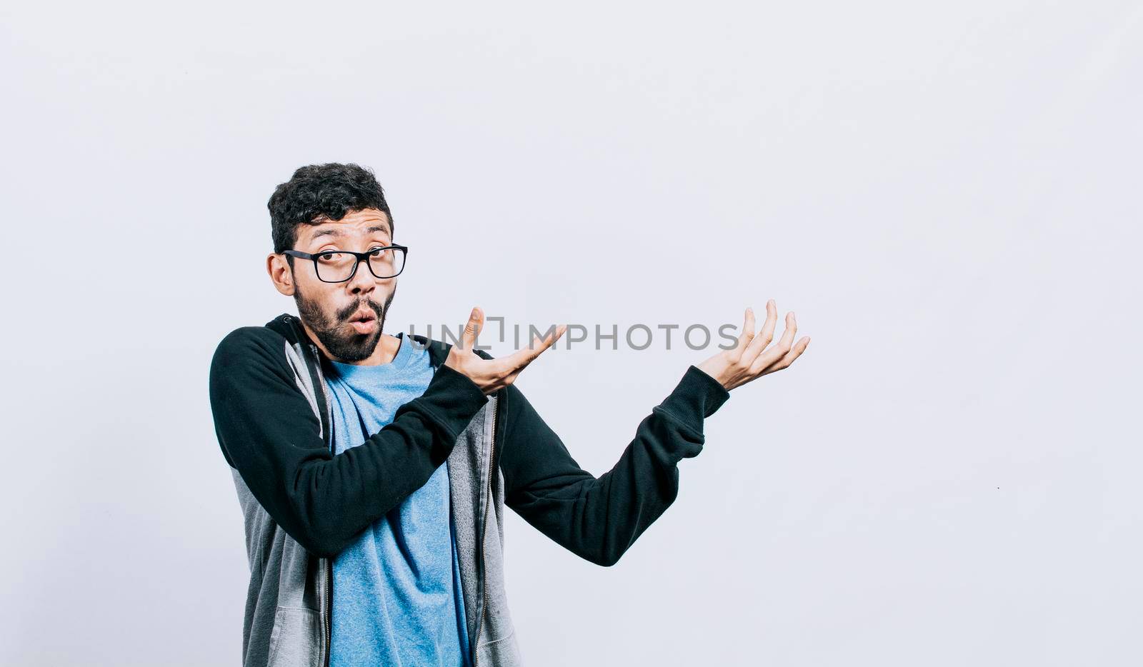 Person pointing palms to the side, Shocked people pointing both hands to the right, Shocked guy pointing his hands to the side of space