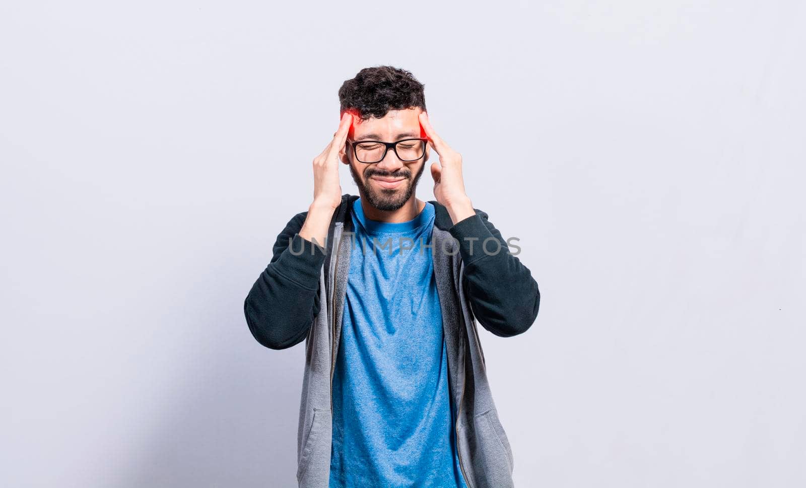 People rubbing his head on isolated background, Concept of a person with a headache, guy giving himself a head massage, concept of a man with a migraine