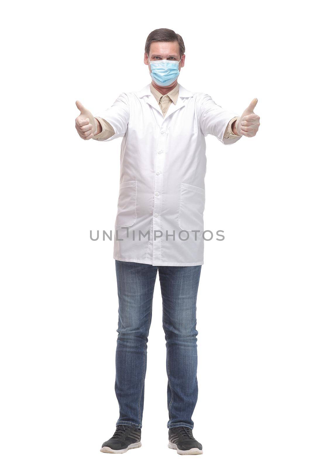 Portrait of caucasian doctor using protective gloves and mask by asdf