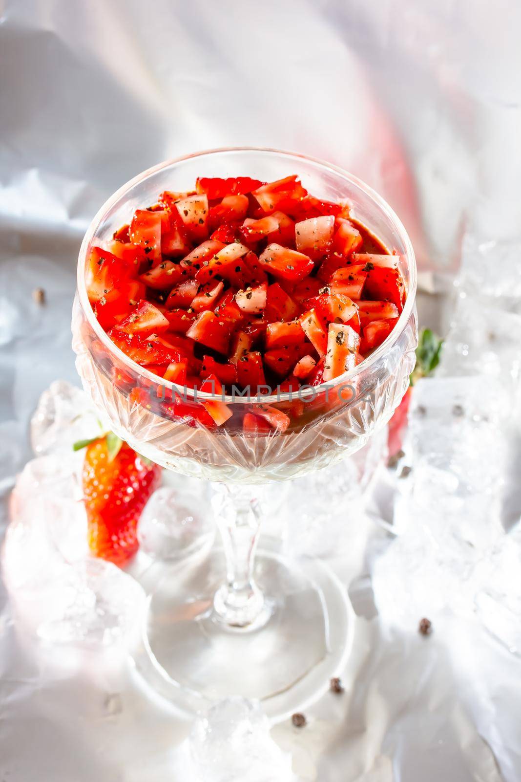 luxurious dessert Tiramisu in a glass with coffee beans, tiramisu with chocolate and strawberries.
