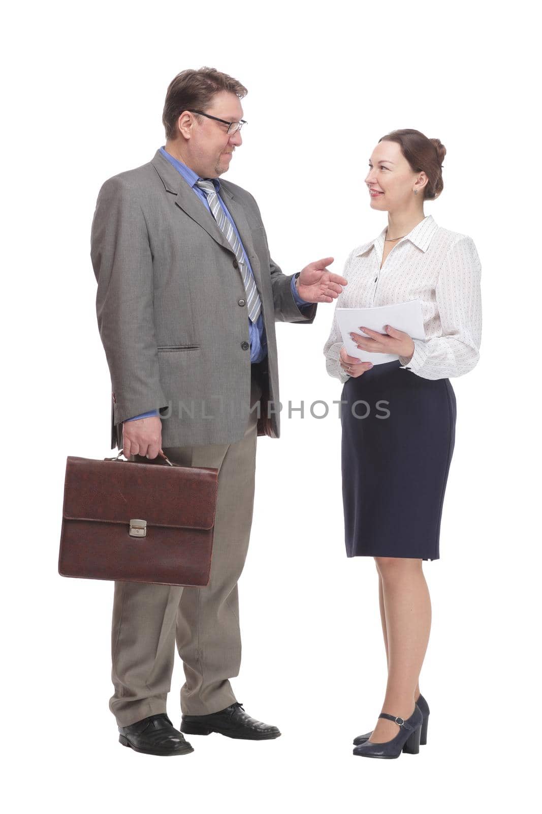 in full growth. businessman and business woman . isolated on a white background.